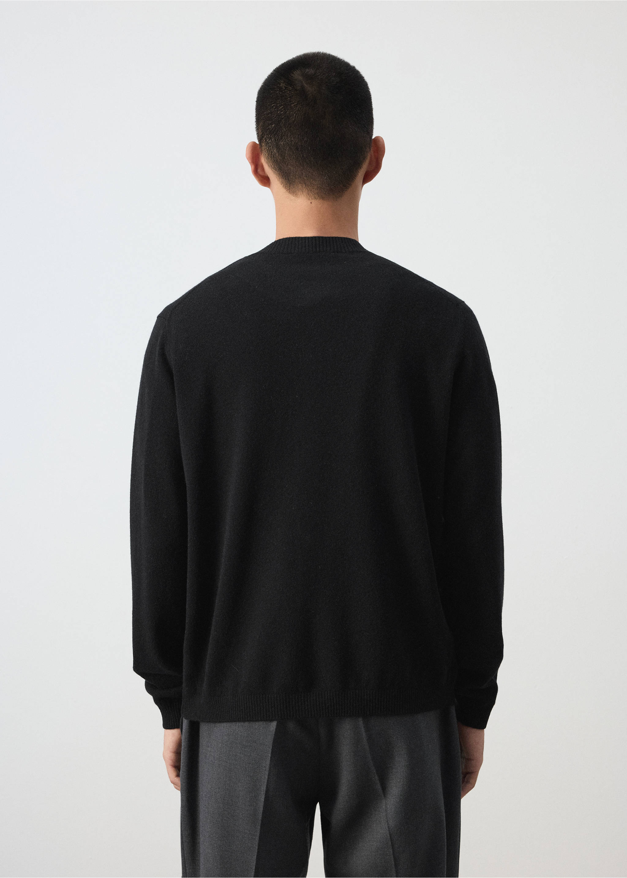 Back view of a black cardigan with a ribbed crew neck., Black. Ref: 37067886-00.