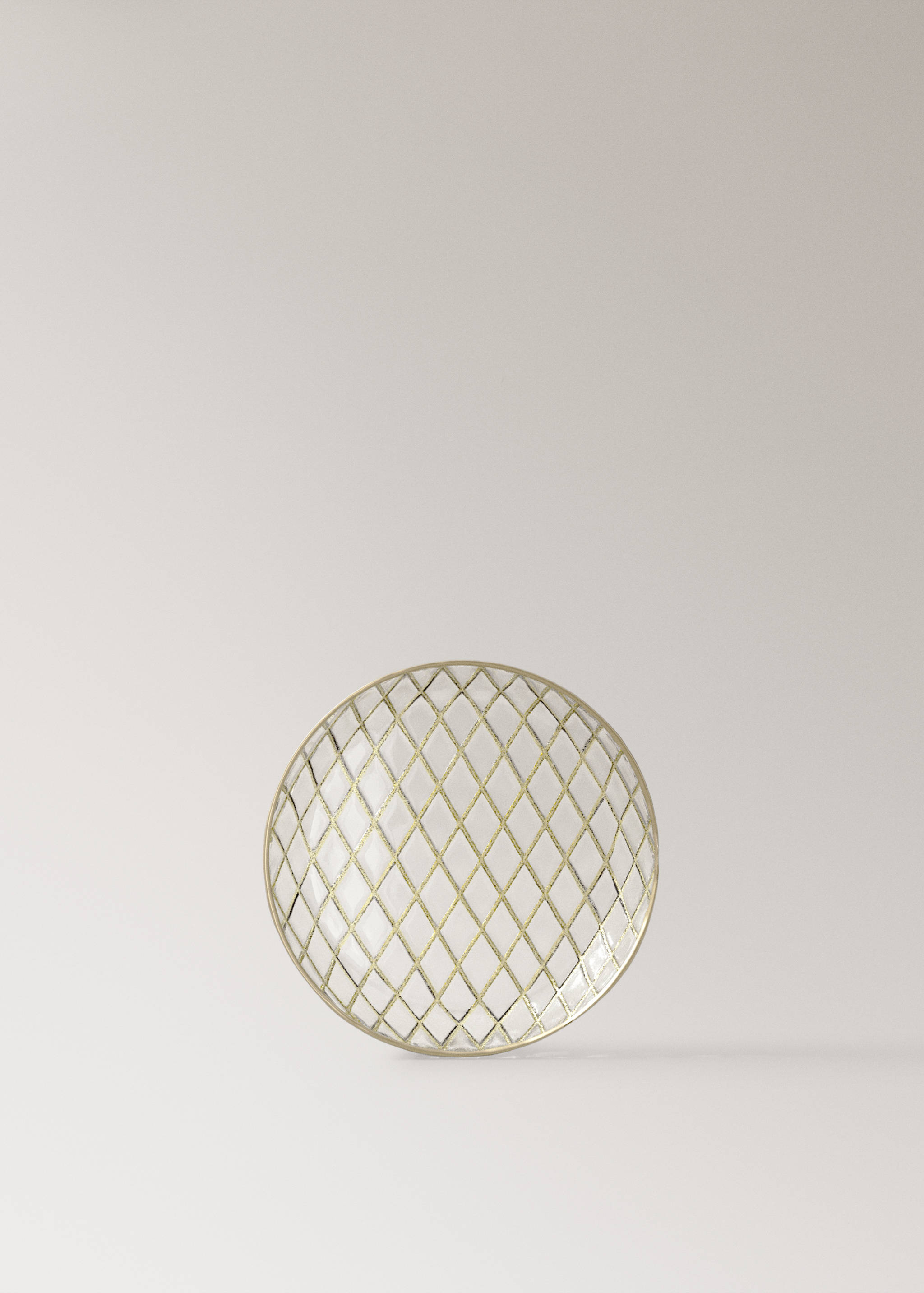 Clear glass plate with a gold diamond lattice pattern.