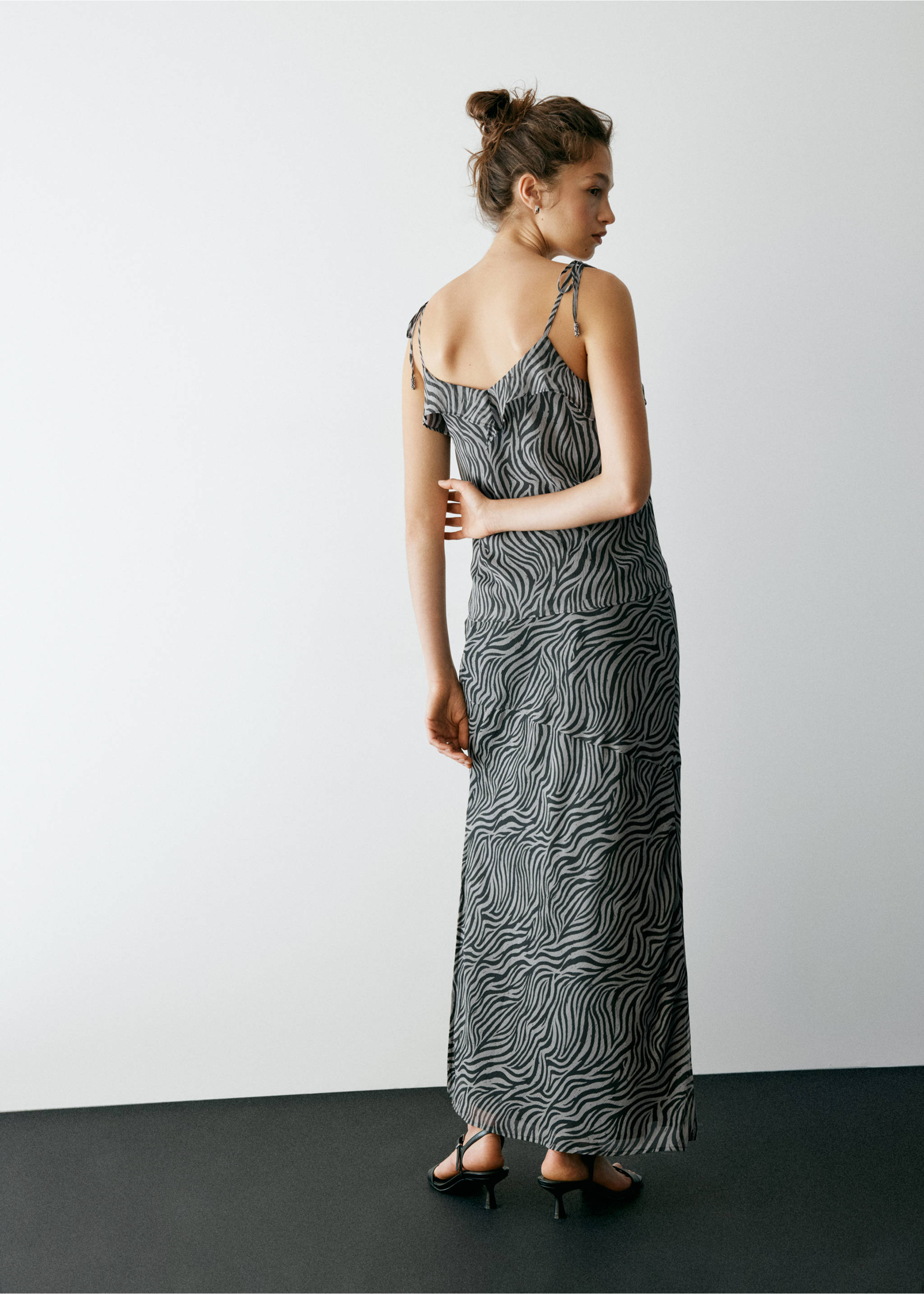 Back view of a grey and black zebra-print long skirt with tie-shoulder straps., Brown. Ref: 37067910-00.