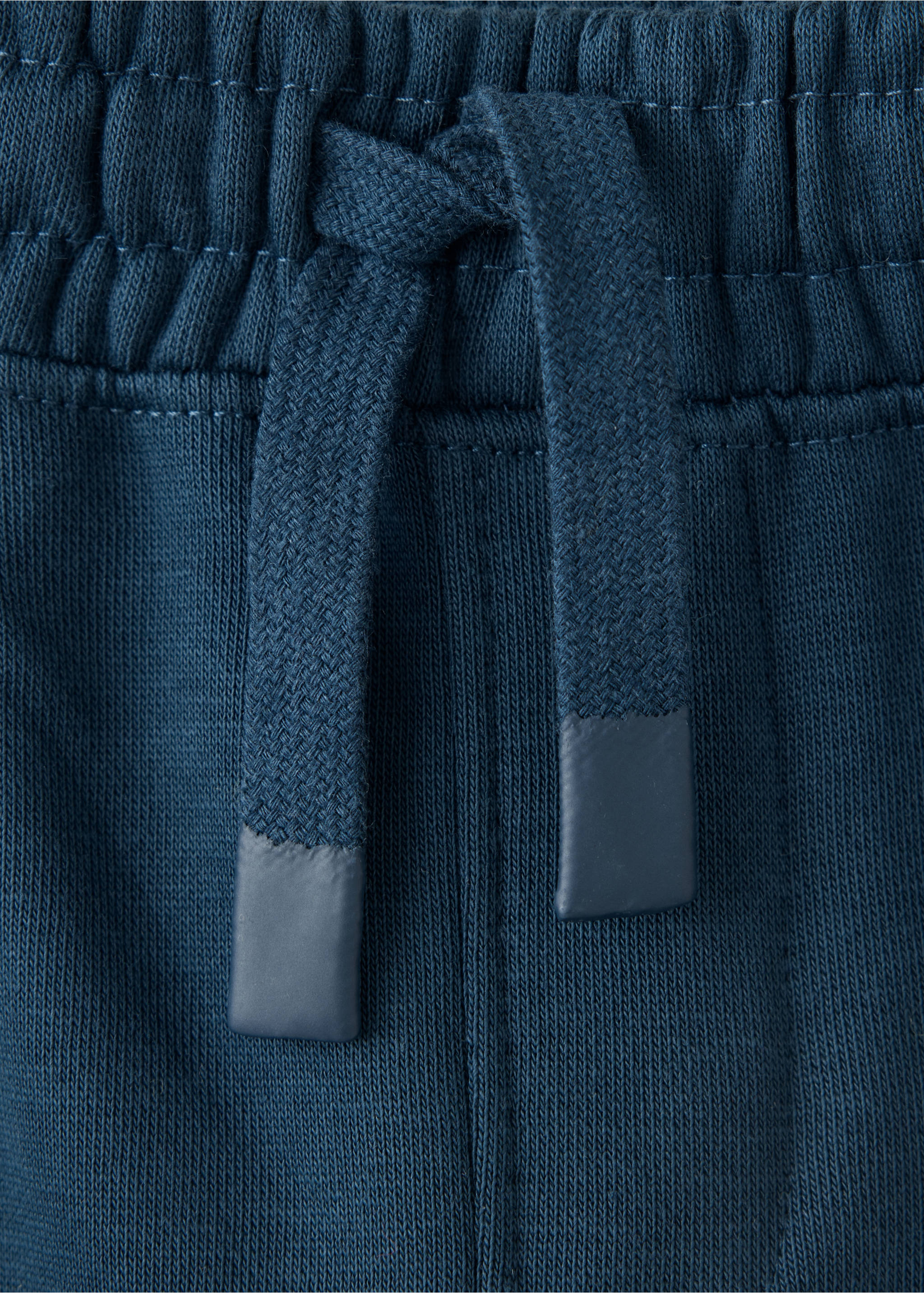 Elastic cotton joggers - Details of the article 8, Navy. Ref: 37067913-00.