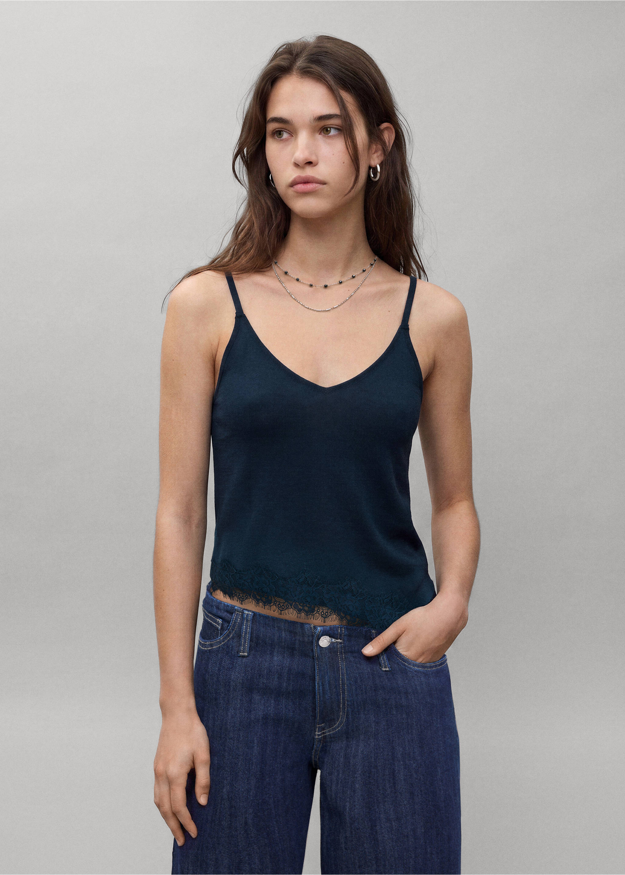 Navy blue camisole top with thin straps, V-neckline, and lace trim hem., Navy. Ref: 37067917-00.