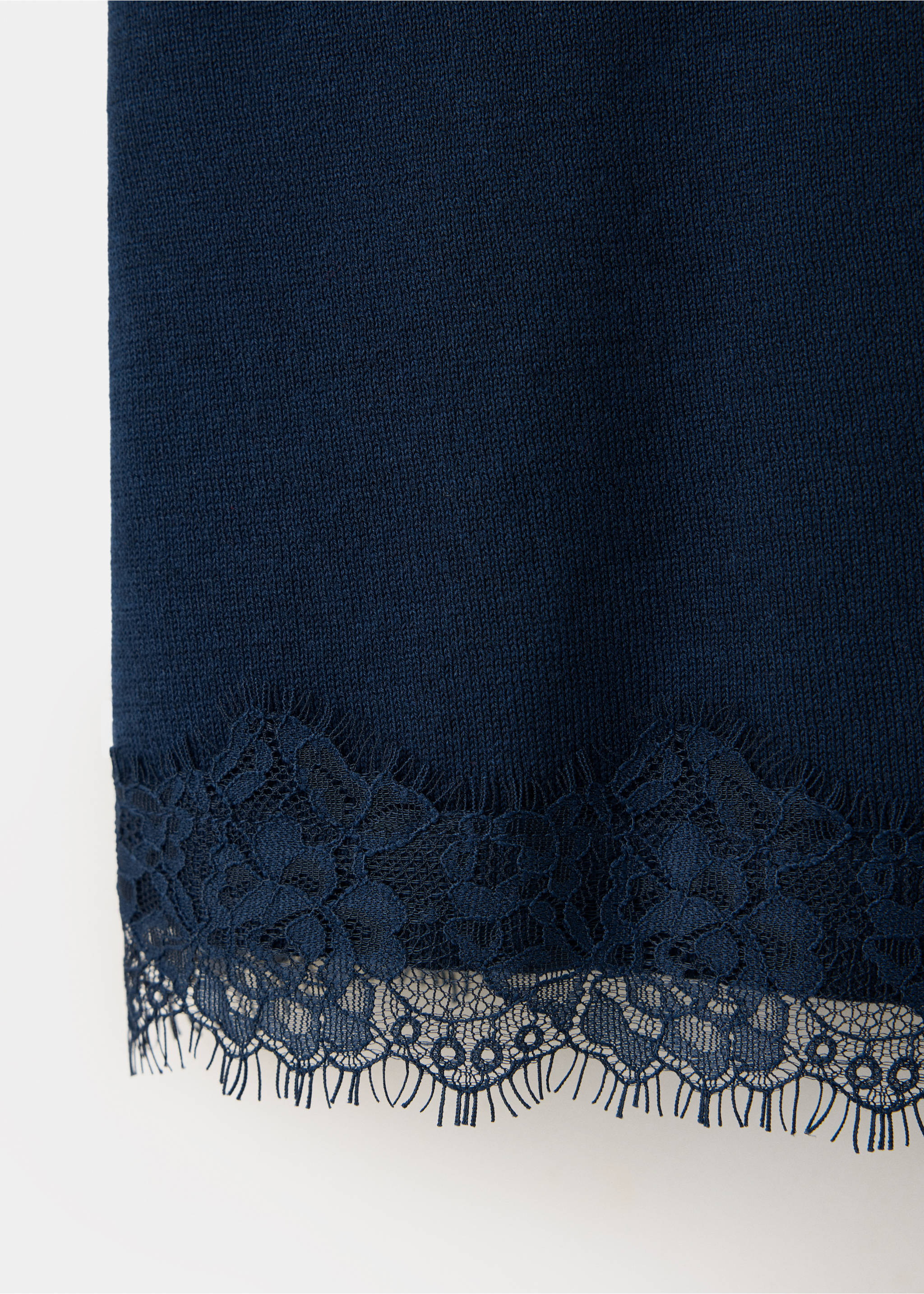 Close-up of the dark navy knit top, showing the fine texture and lace trim., Navy. Ref: 37067917-00.