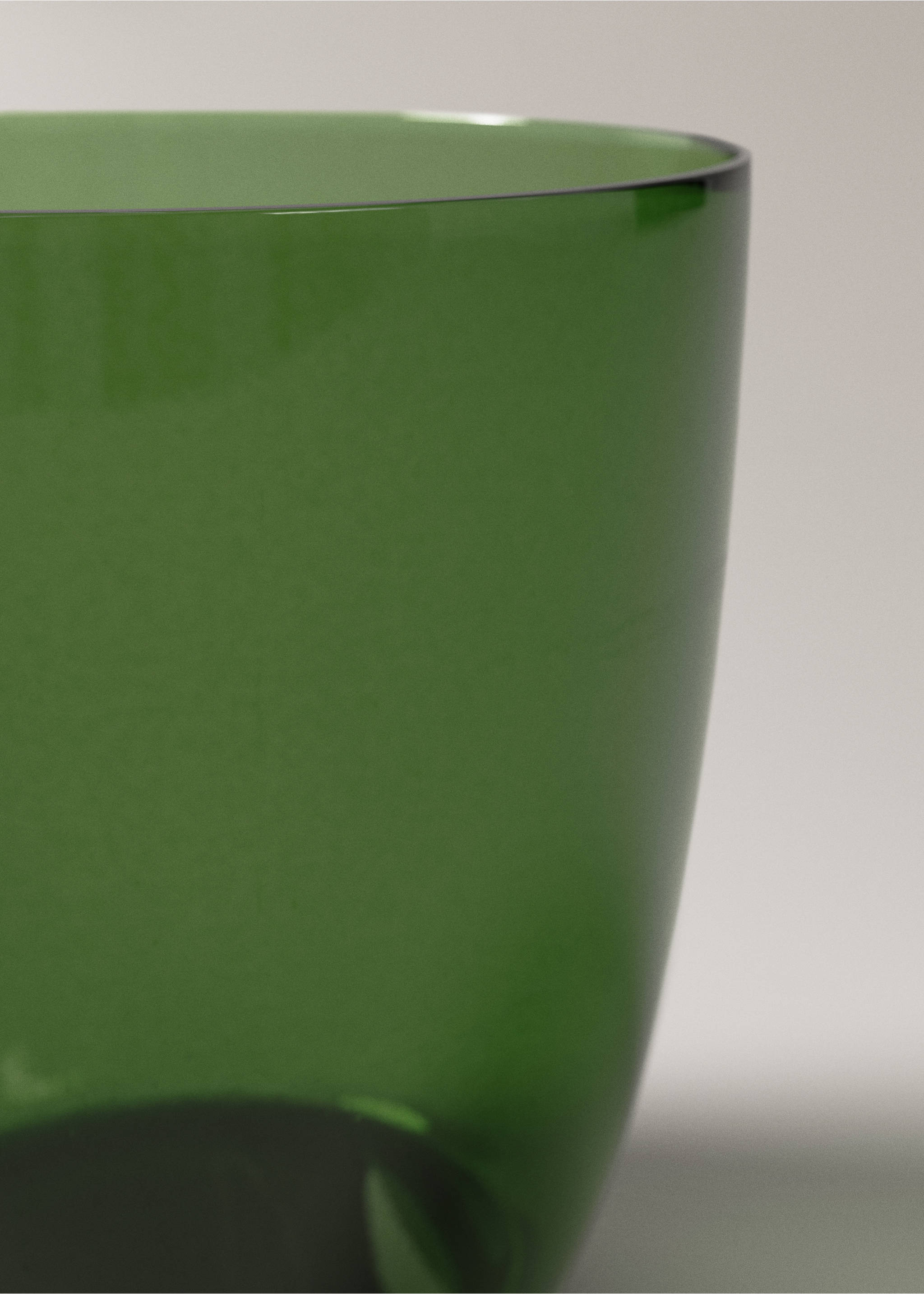 Close-up of a green glass tumbler showcasing its translucent finish., Green. Ref: 37067919-00.