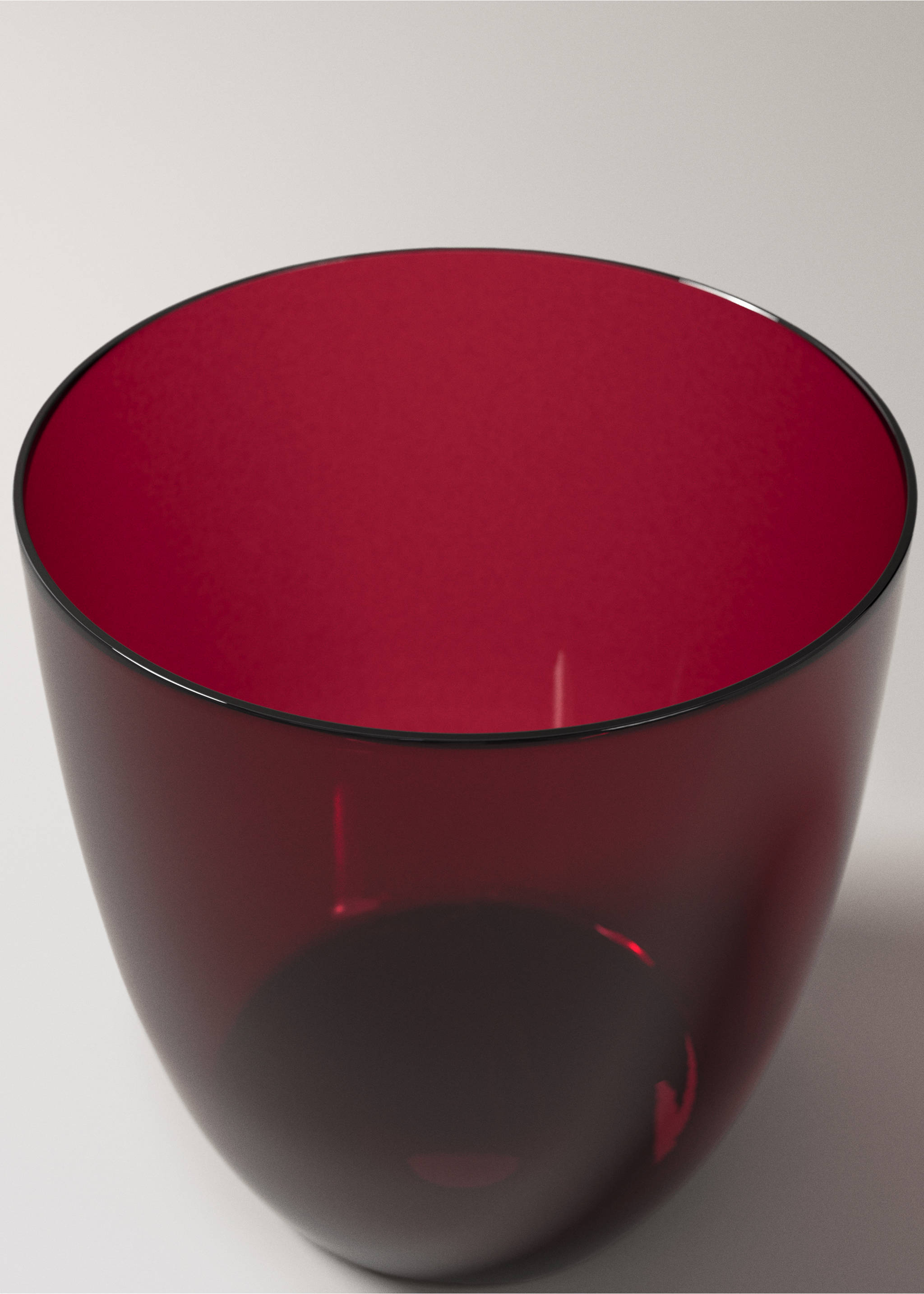 Close-up of a deep red glass tumbler., Red. Ref: 37067919-00.