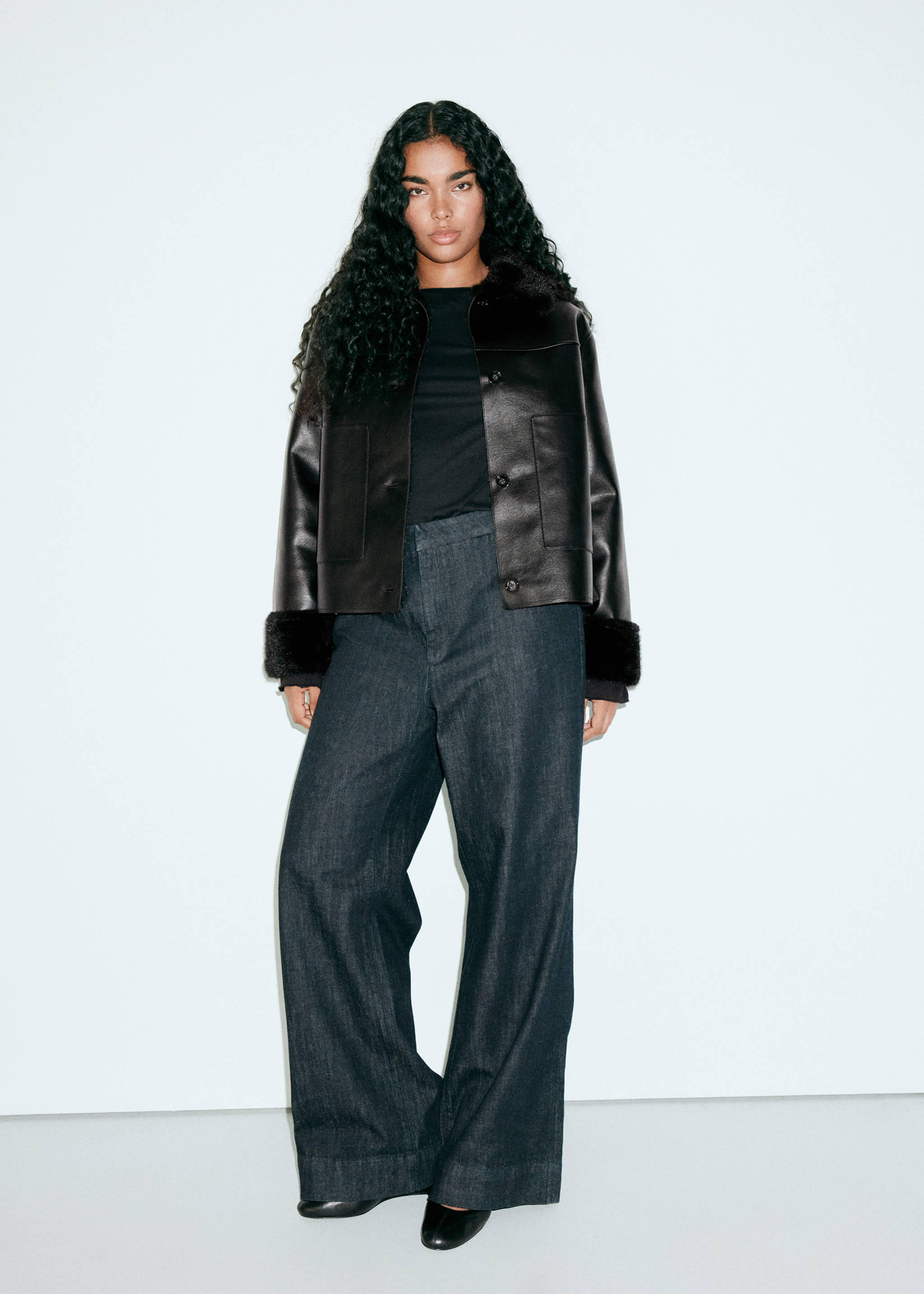 Black jacket with faux-fur collar and cuffs, worn with dark trousers., Black. Ref: 37067920-00.