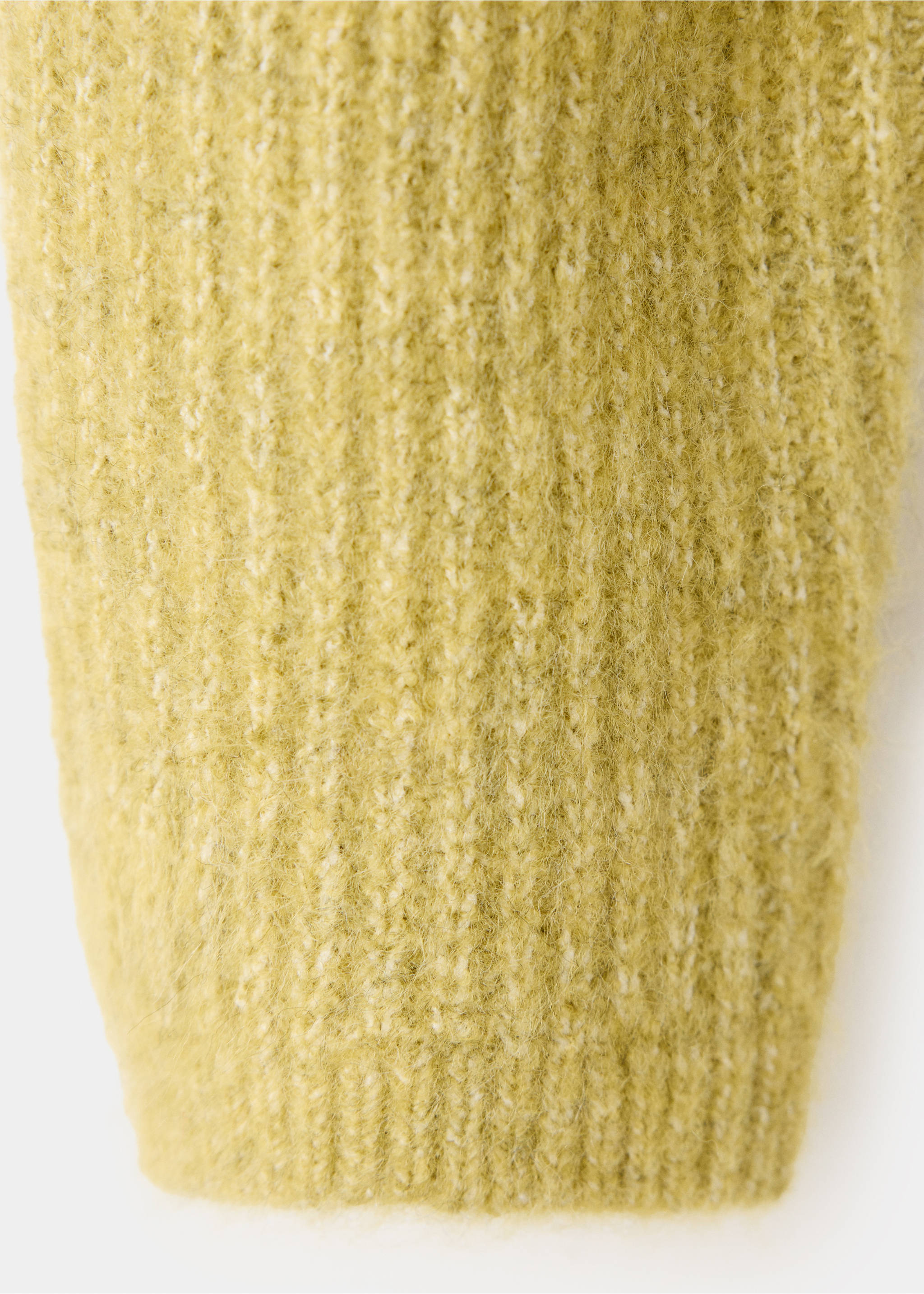 Close-up of the soft, fuzzy ribbed knit fabric of a yellow-green cardigan., Lime. Ref: 37067923-00.