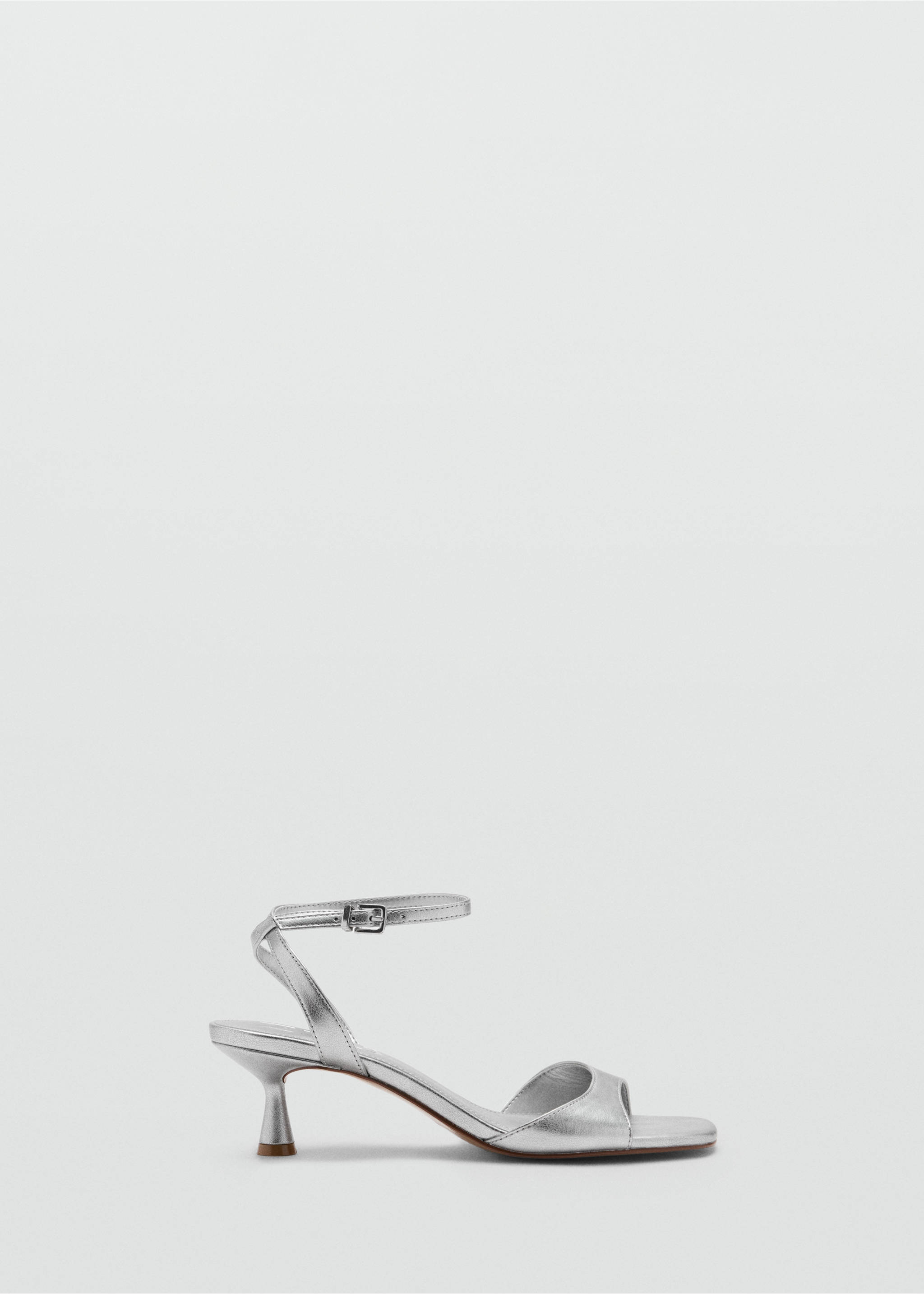 Metallic silver kitten-heel sandal with a narrow toe strap and buckled ankle strap., Silver. Ref: 37067924-00.
