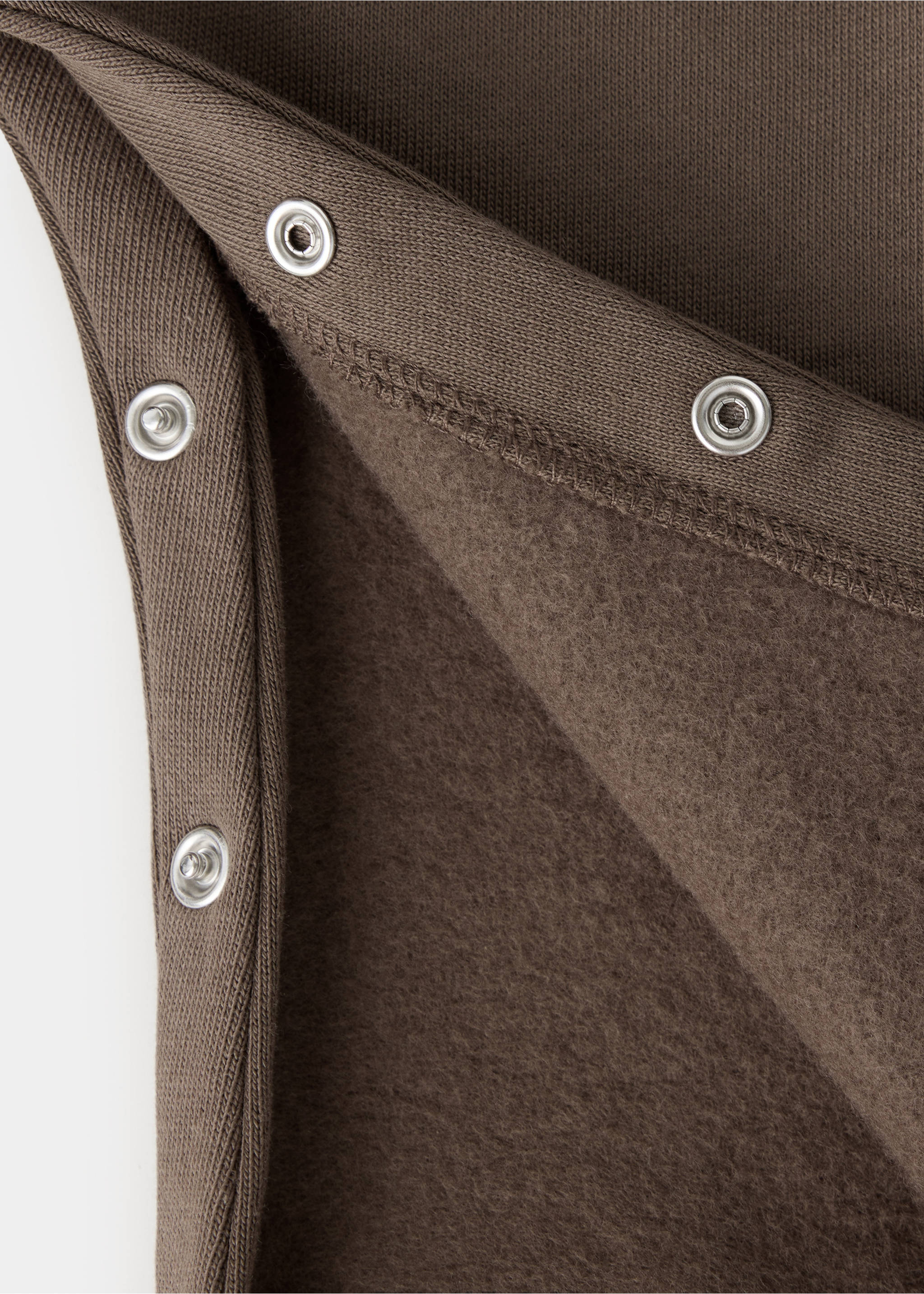 Brown children's dungaree fabric detail showing press-studs, Chocolate. Ref: 37067925-00.