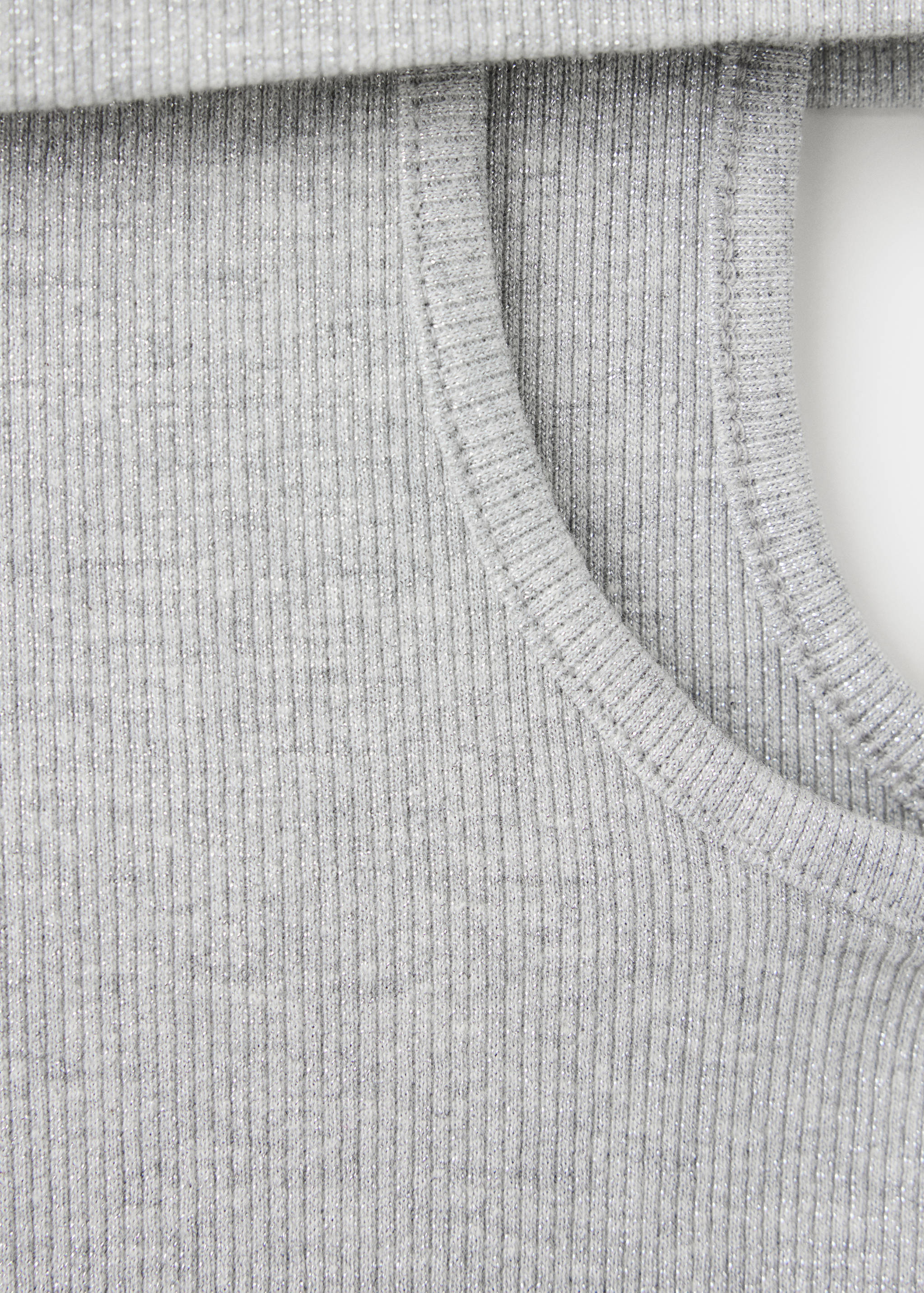 Silver metallic ribbed top fabric detail.