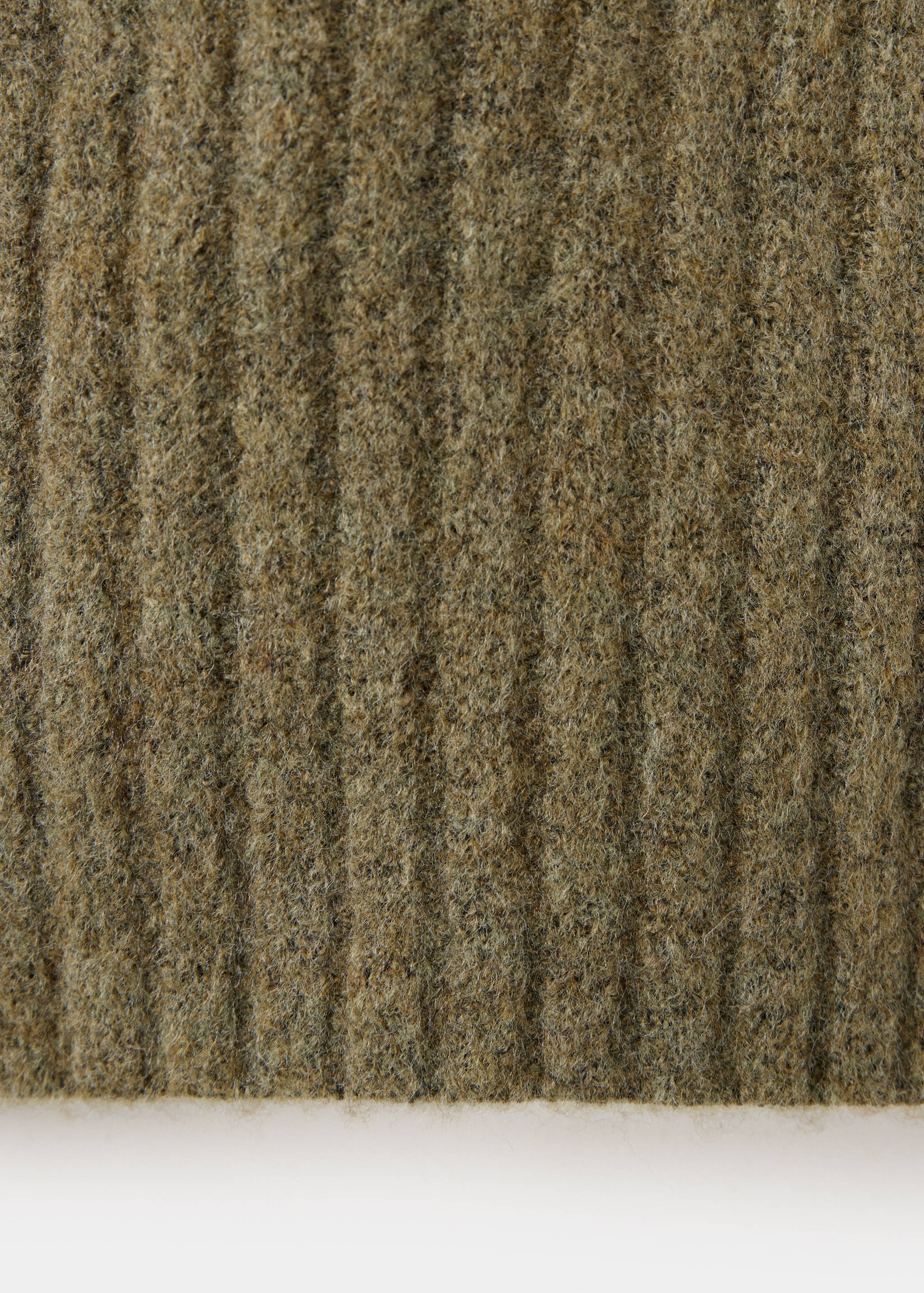Green knit jersey fabric texture detail
