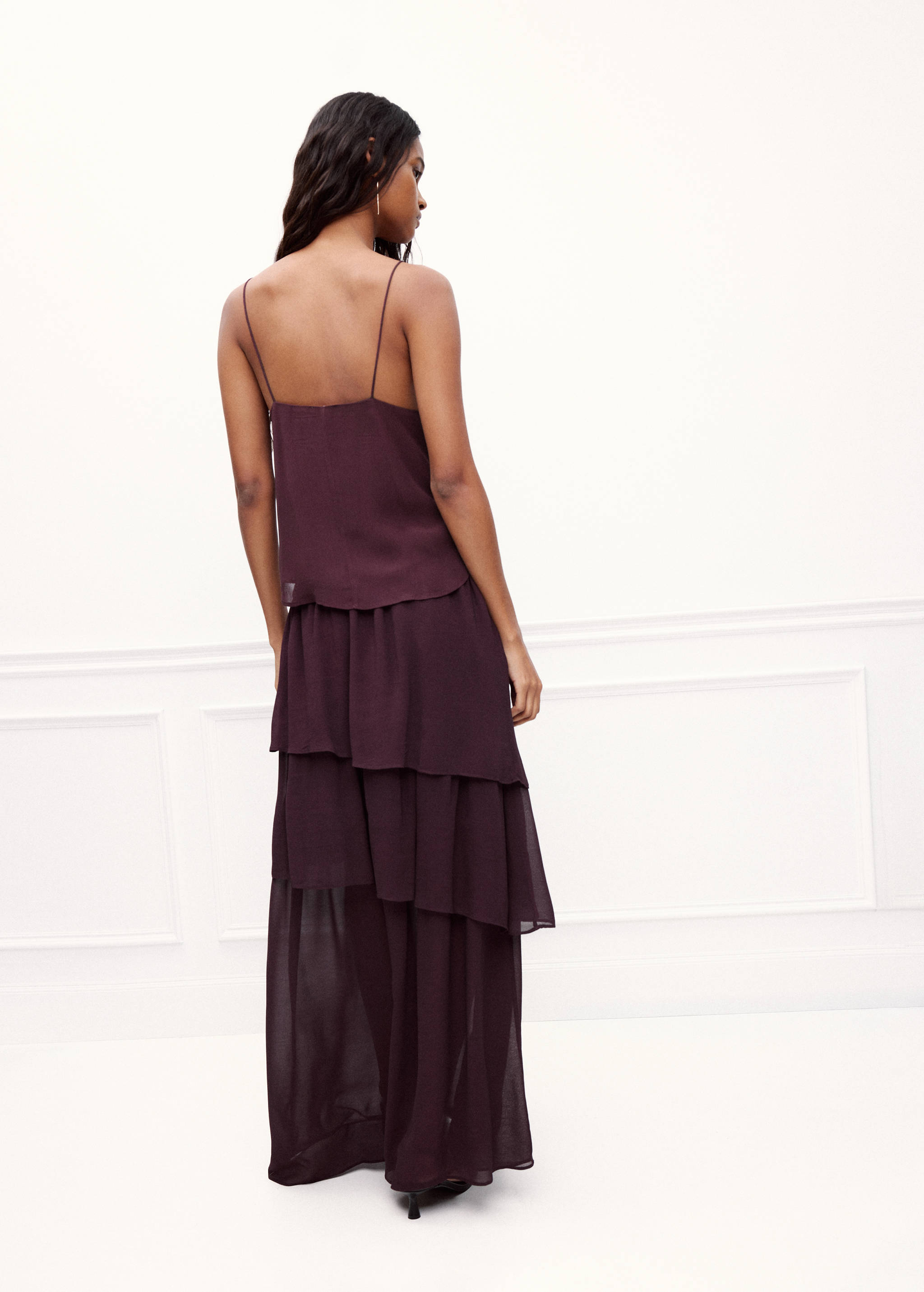 Dark plum tiered maxi skirt, back view.