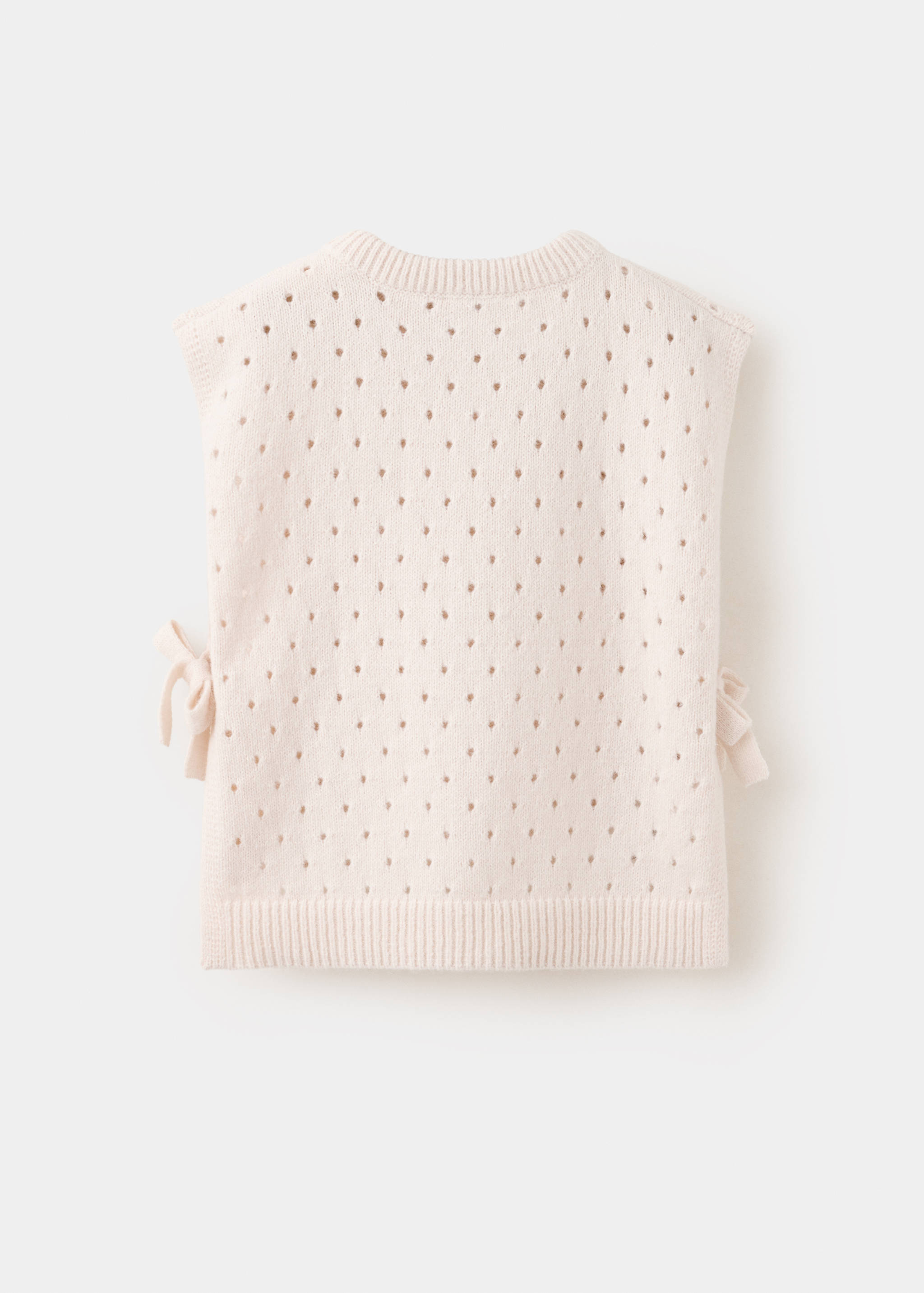 Back view of a light pink pointelle knit kids' vest with side ties.