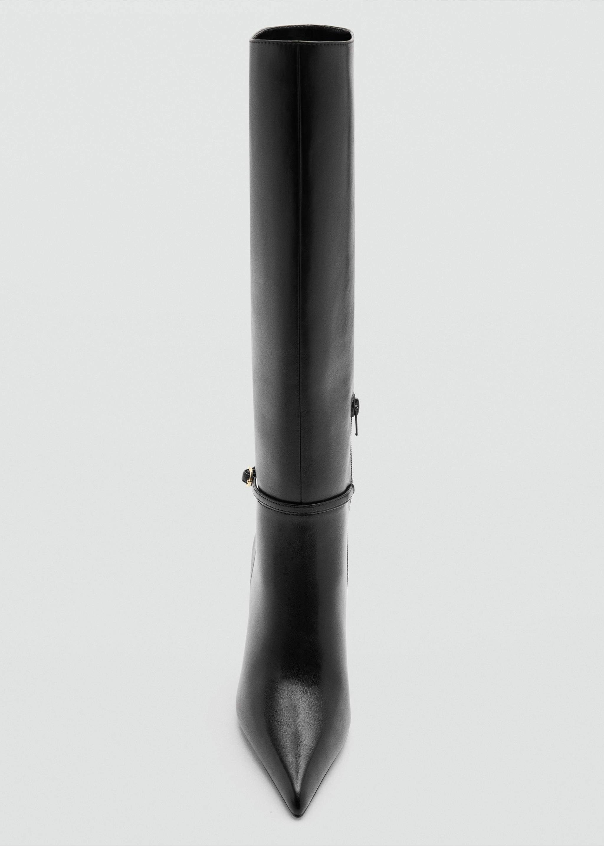 Close-up of a black knee-high boot with a pointed toe and ankle strap detail., Black. Ref: 37068279-00.