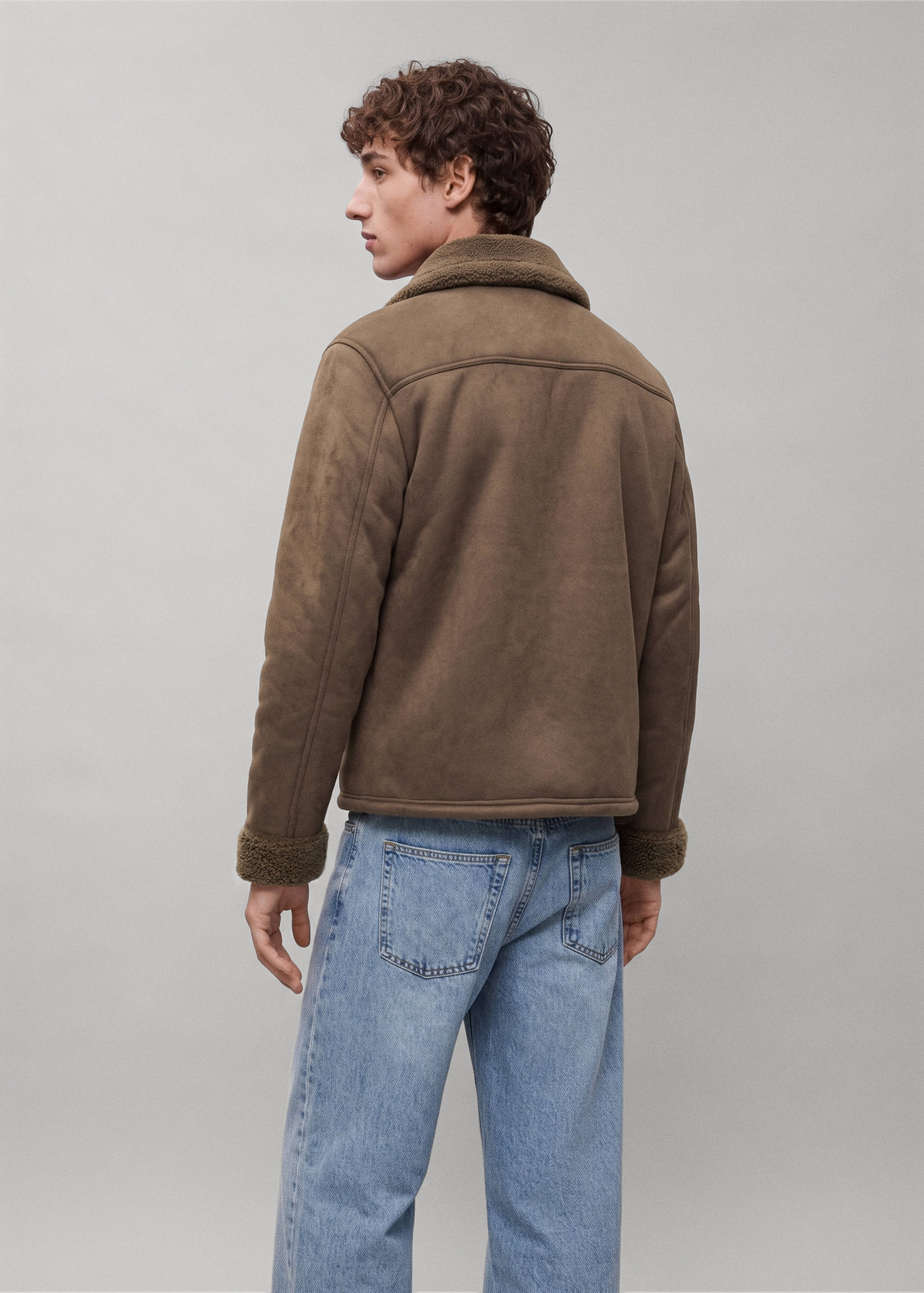 Brown coat with fleece lining, shown from the back.