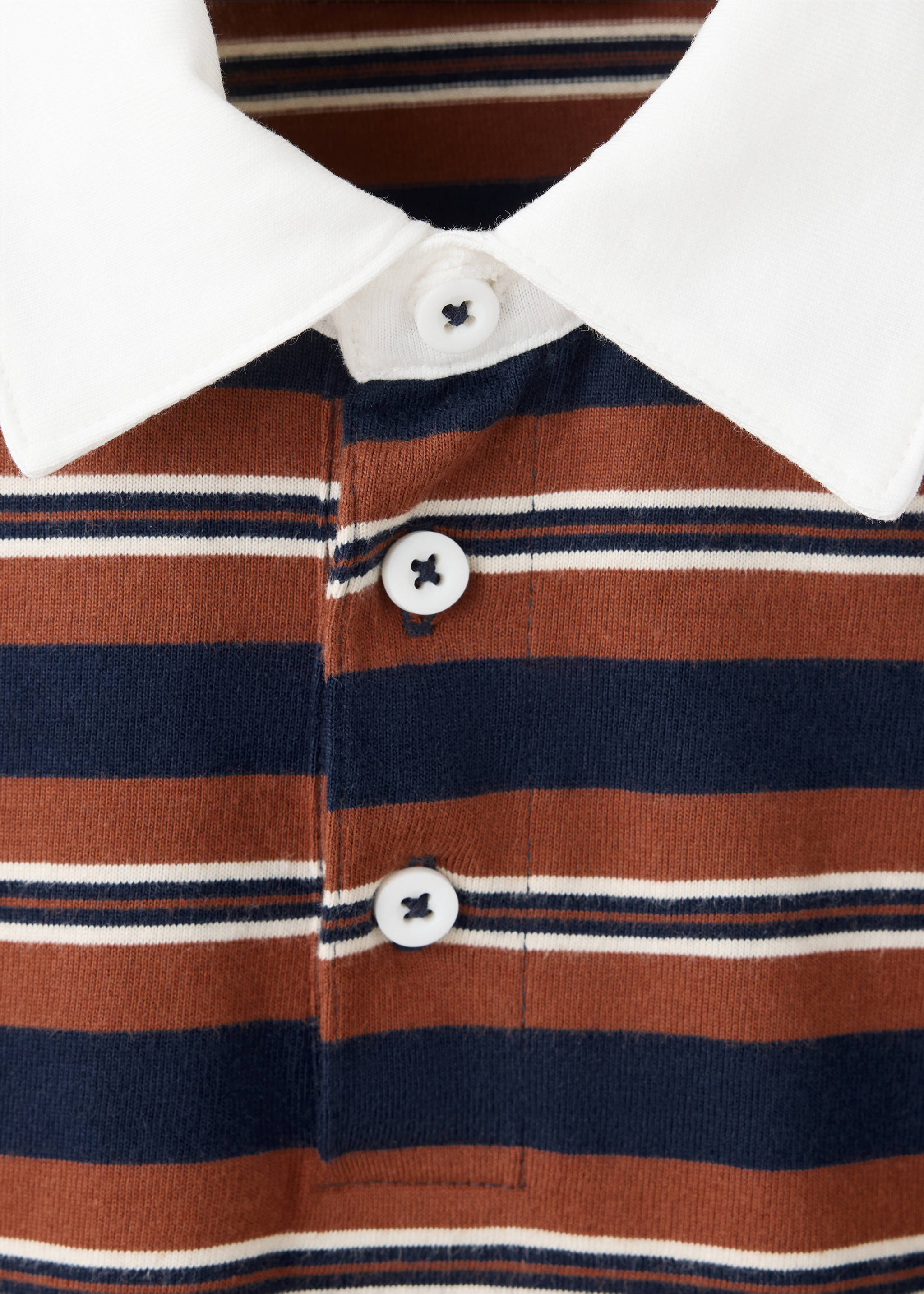 Close-up of a striped kids' polo with a white collar and button placket., Russet. Ref: 37068633-00.
