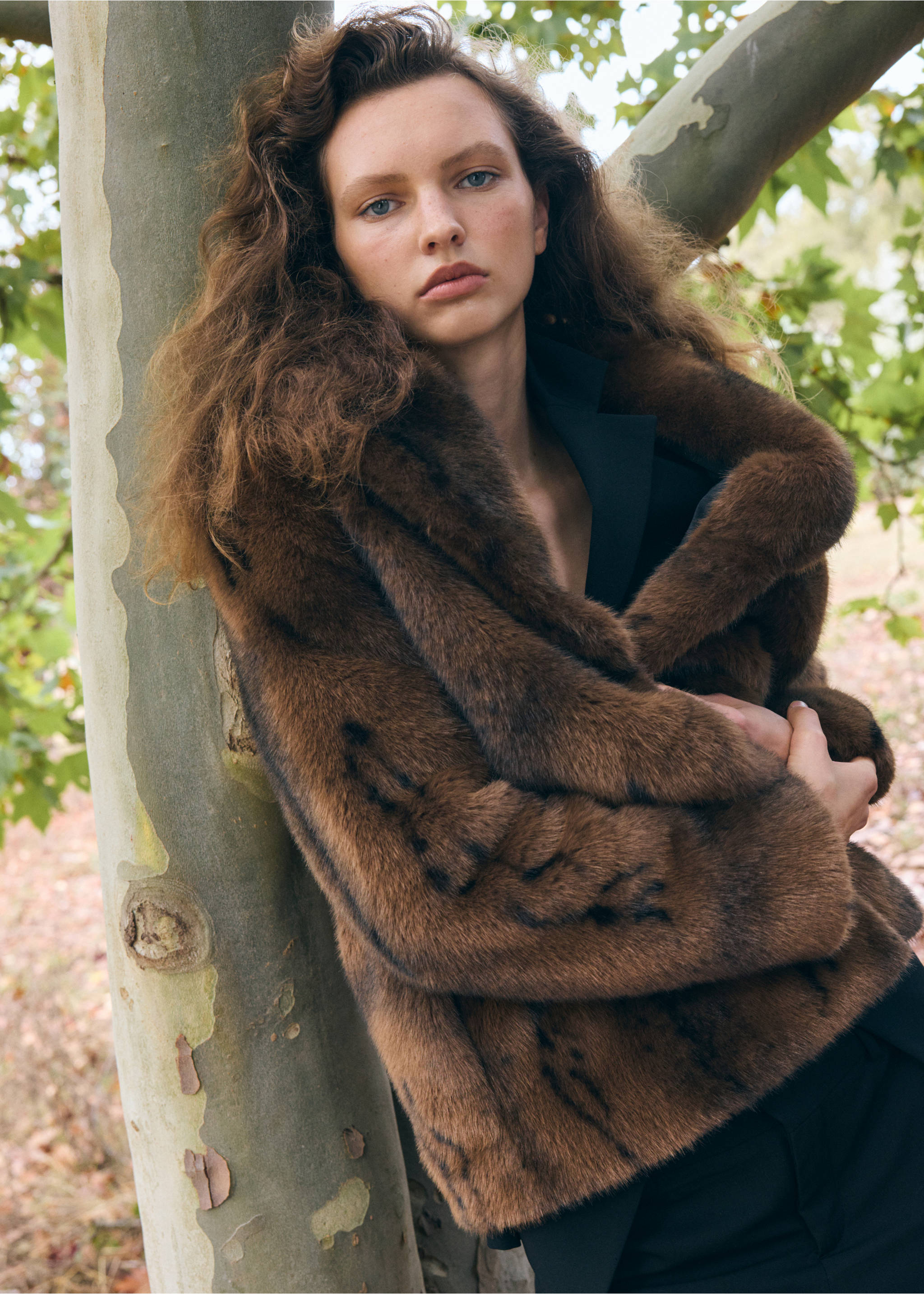 Brown faux-fur coat with a wide collar and short silhouette., Brown. Ref: 37069113-00.