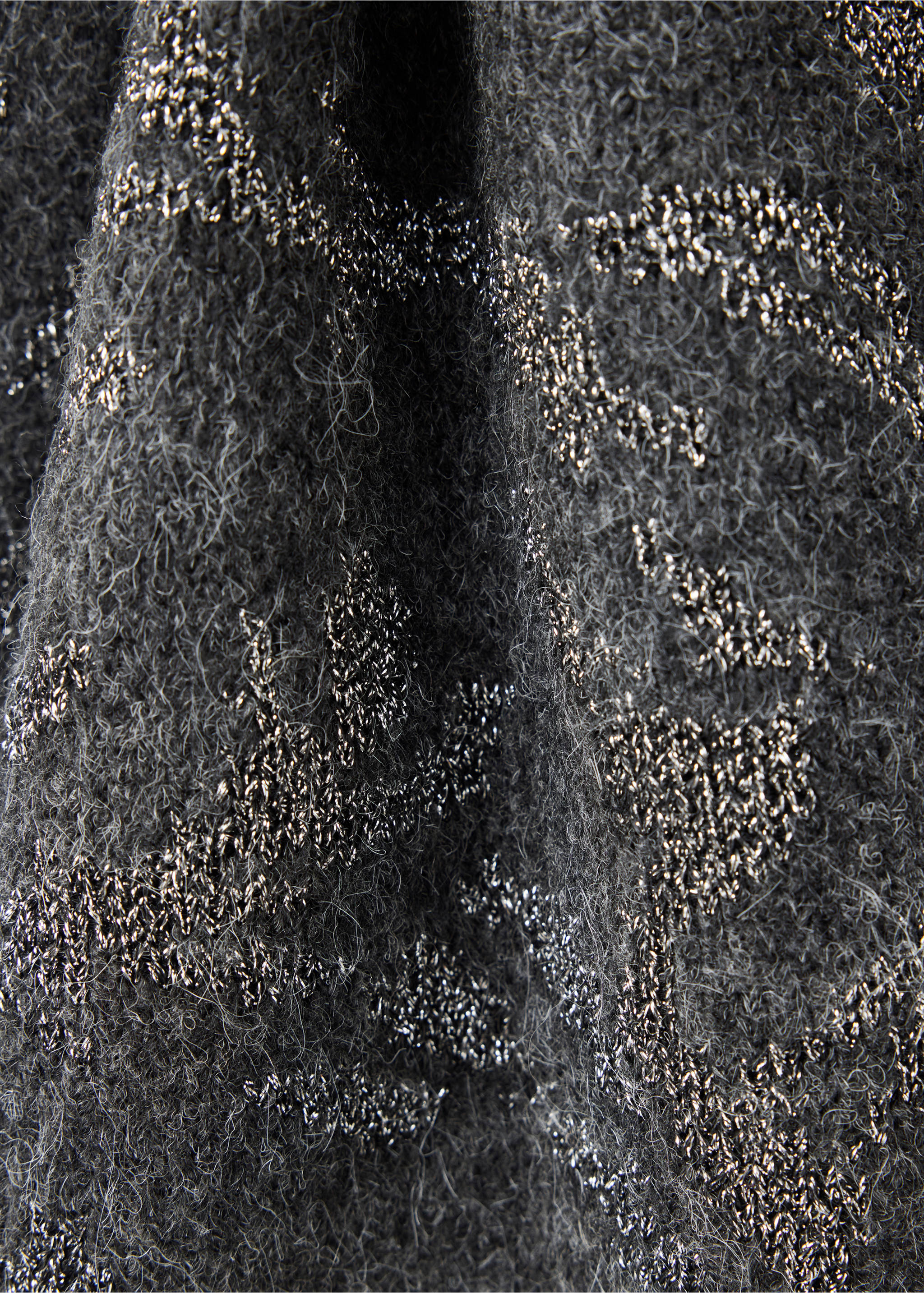 Close-up of the textured grey fabric with metallic details on a jacket., Charcoal. Ref: 37069121-00.