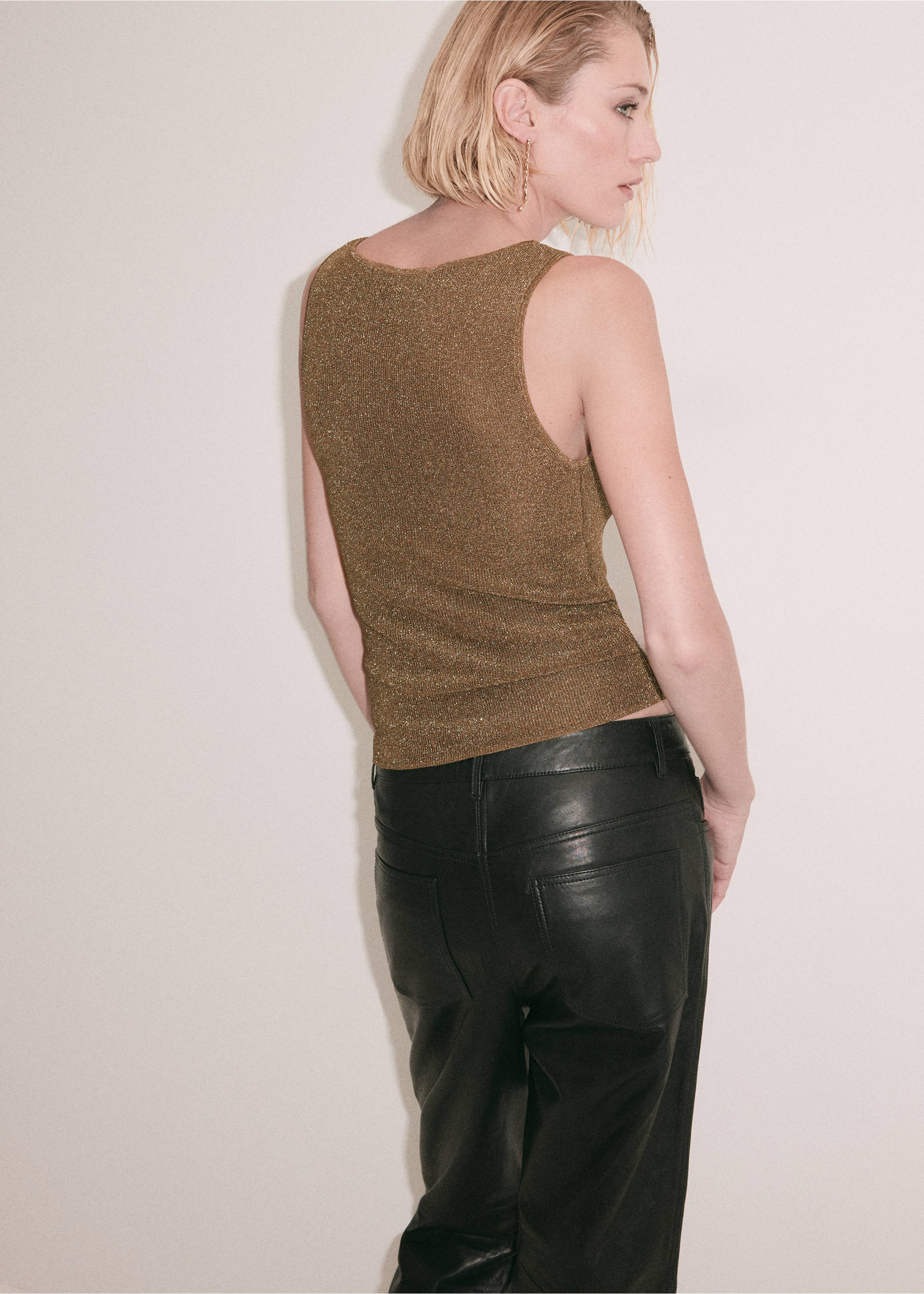 Metallic gold sleeveless top with a scoop neckline, shown from the back., Gold. Ref: 37069126-00.