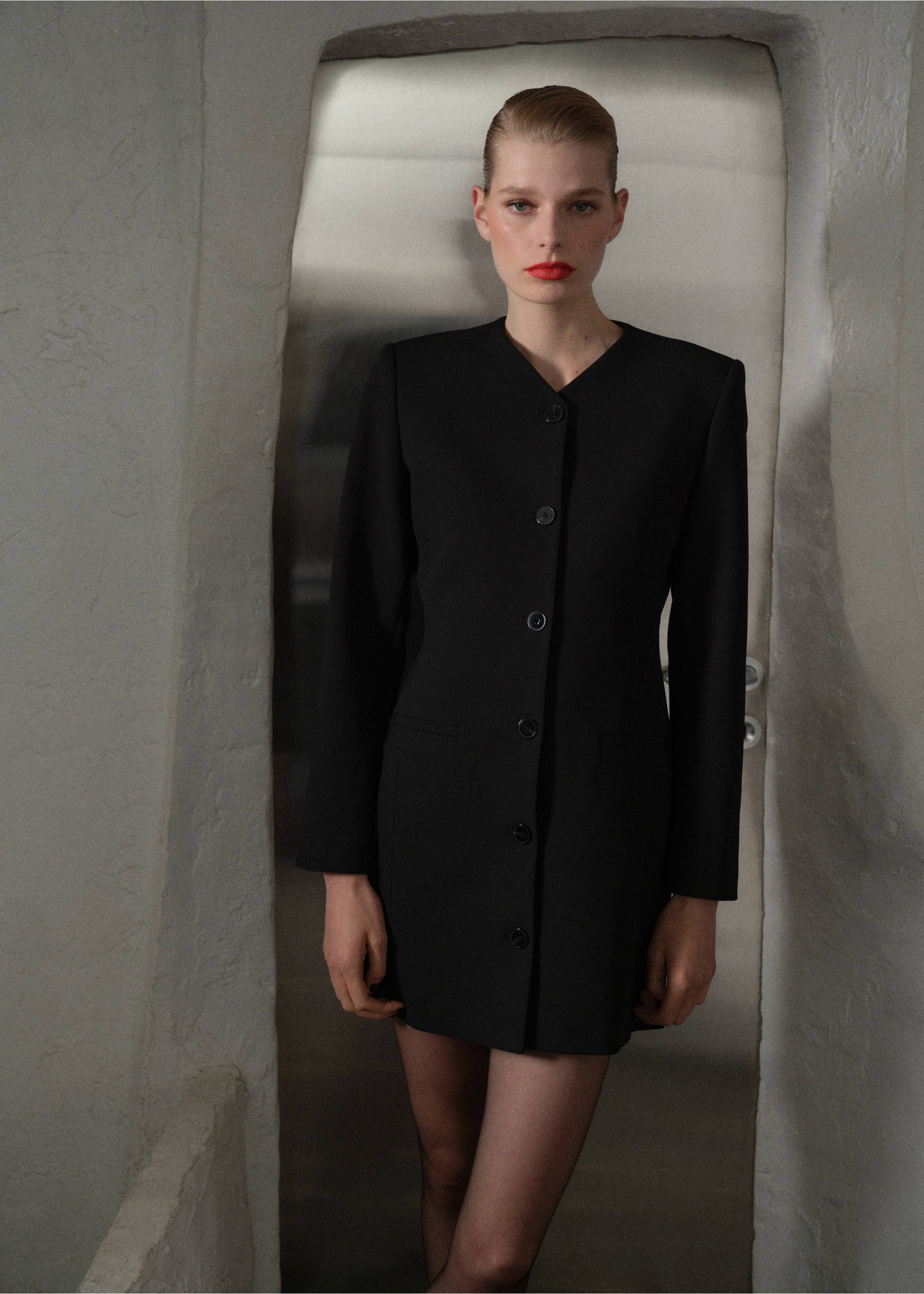 Black long-sleeved button-up dress with structured shoulders., Black. Ref: 37069130-00.