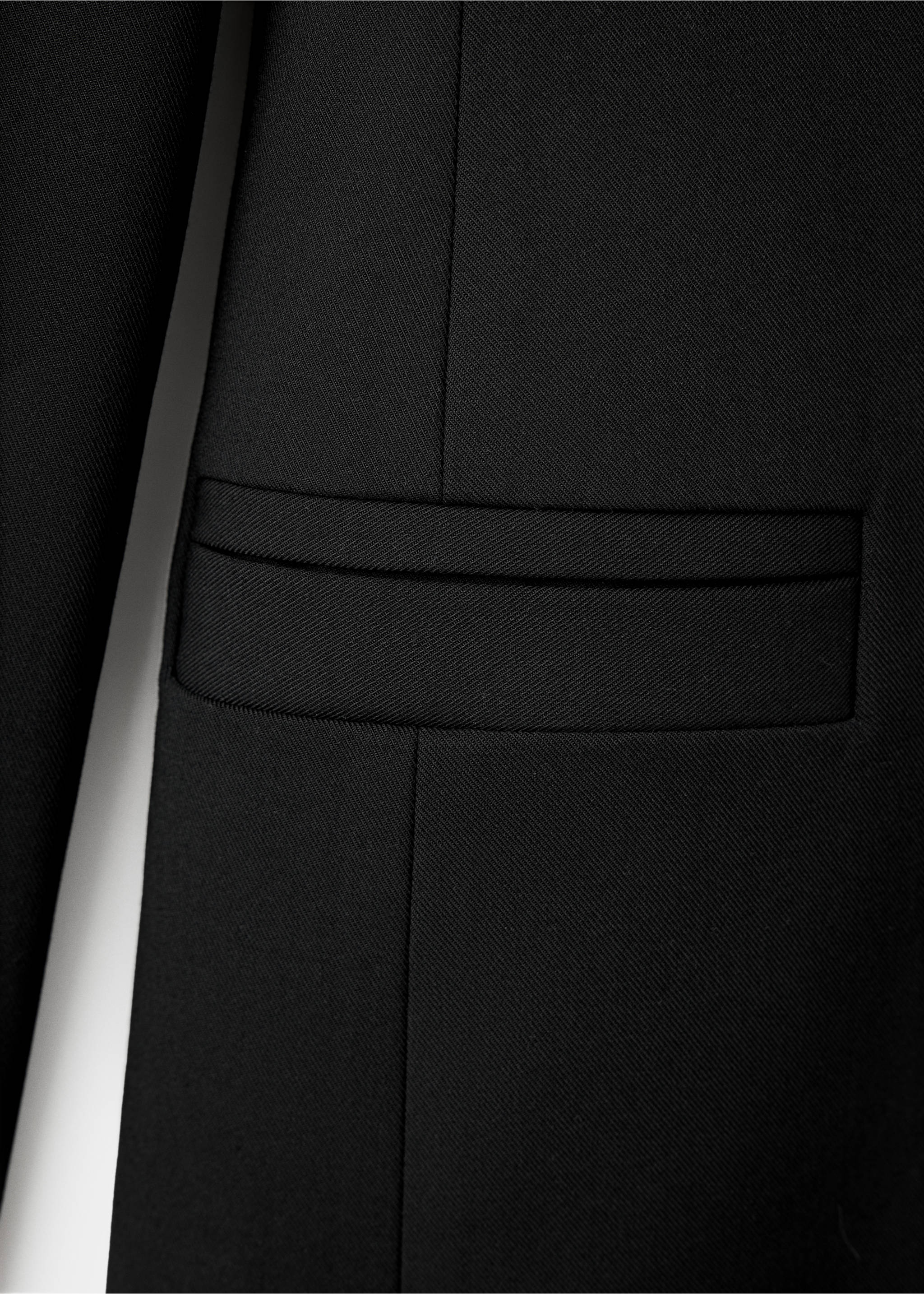 Close-up of black dress fabric showing pocket detail., Black. Ref: 37069130-00.