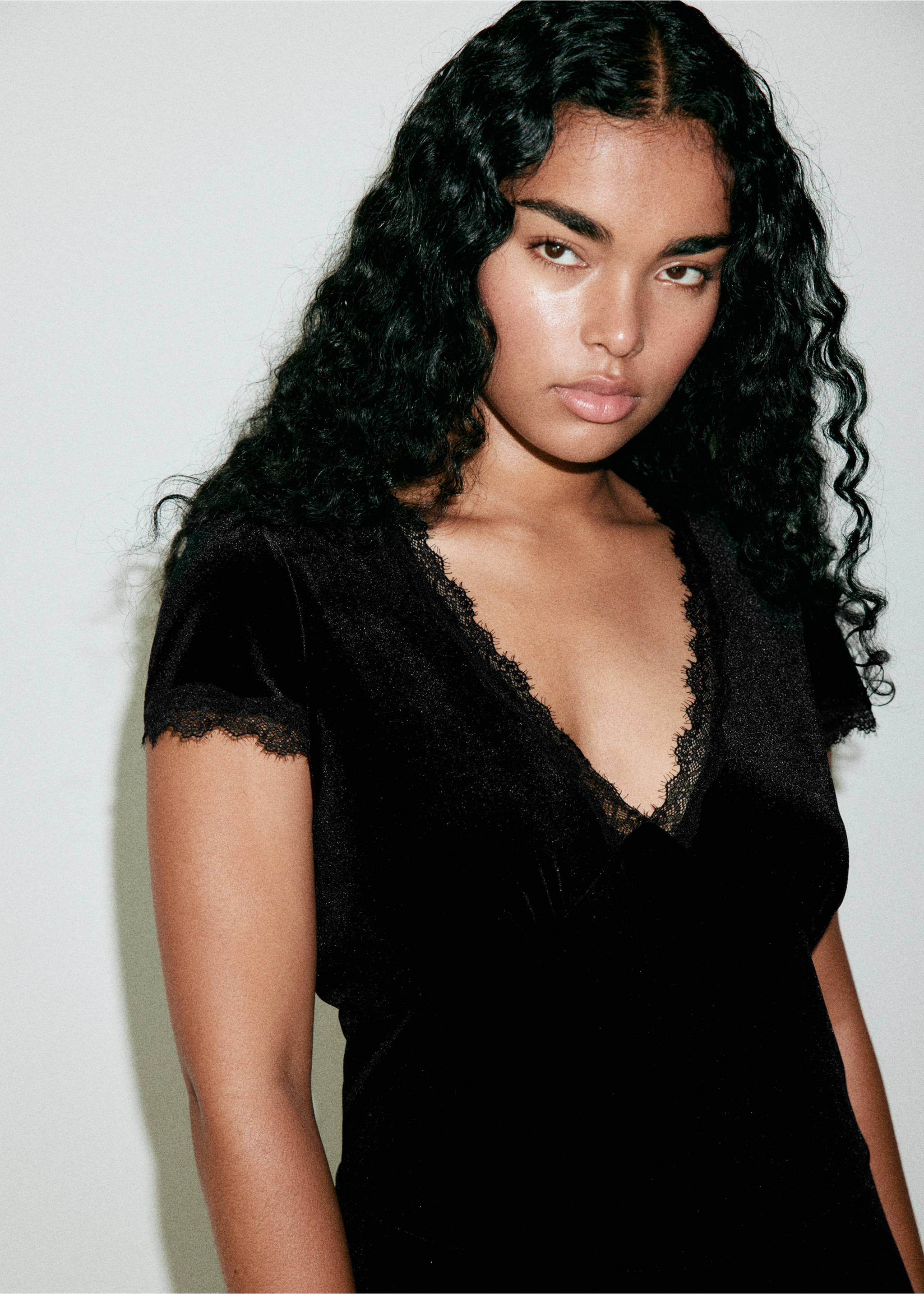 Black velvet jumpsuit with a lace-trimmed V-neck and short sleeves., Black. Ref: 37069131-00.