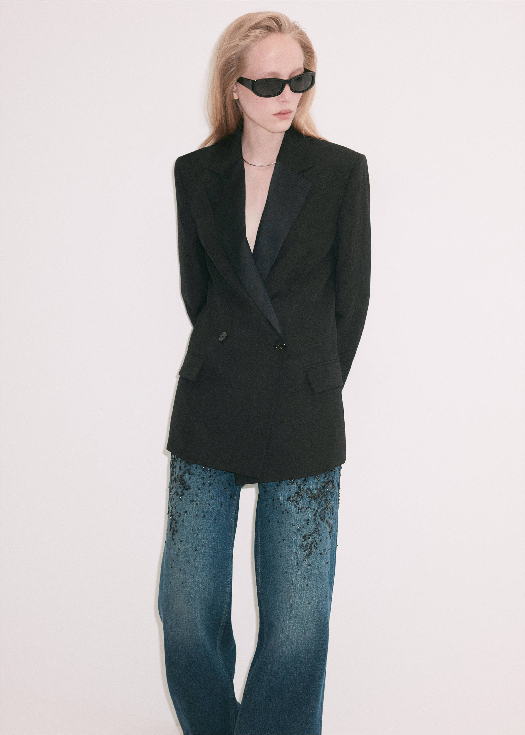 Blue embellished jeans with dark beaded embroidery on the thighs., Dark Blue. Ref: 37069137-00.