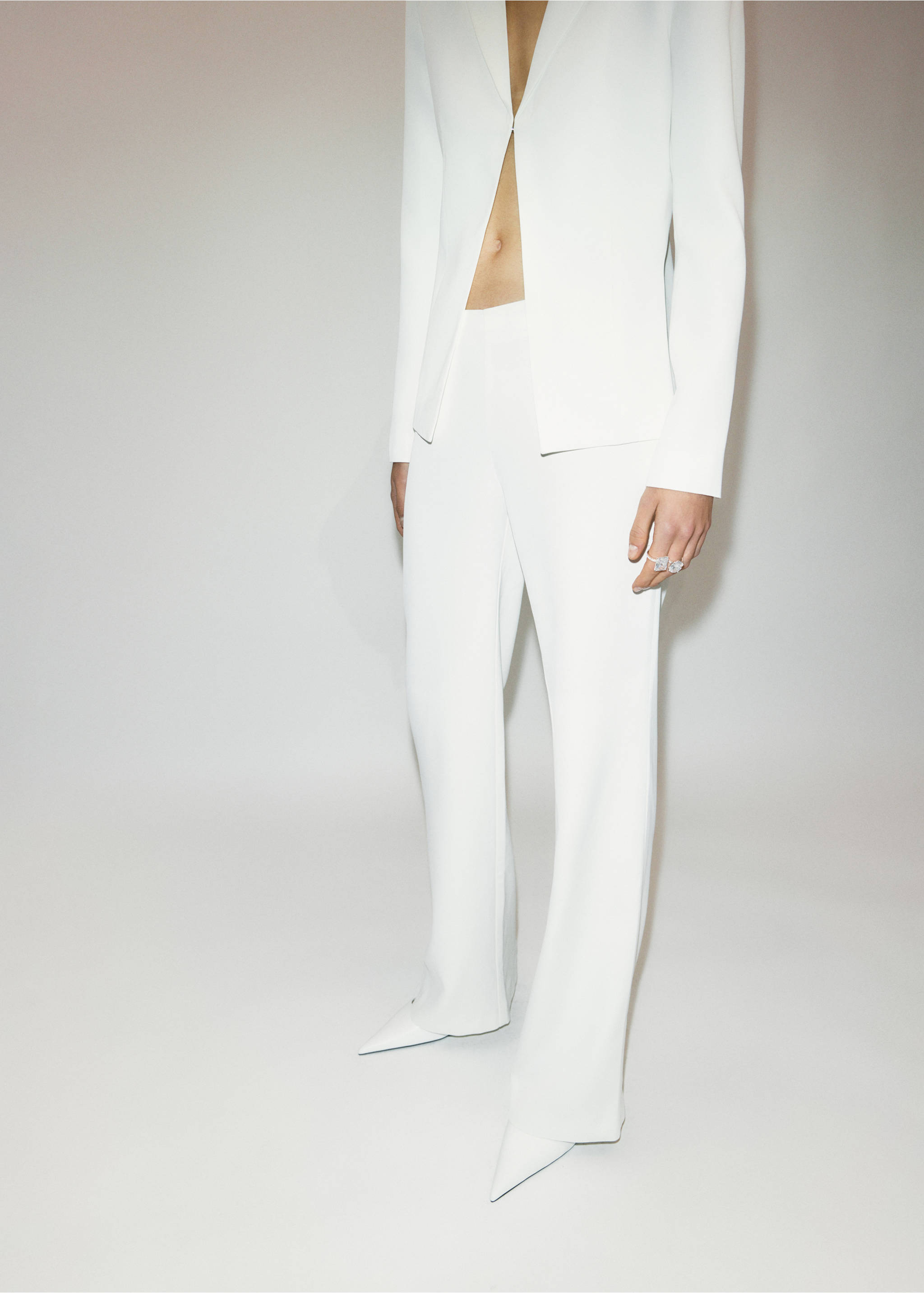 White pointed shoes worn with a matching white suit., White. Ref: 37069139-00.