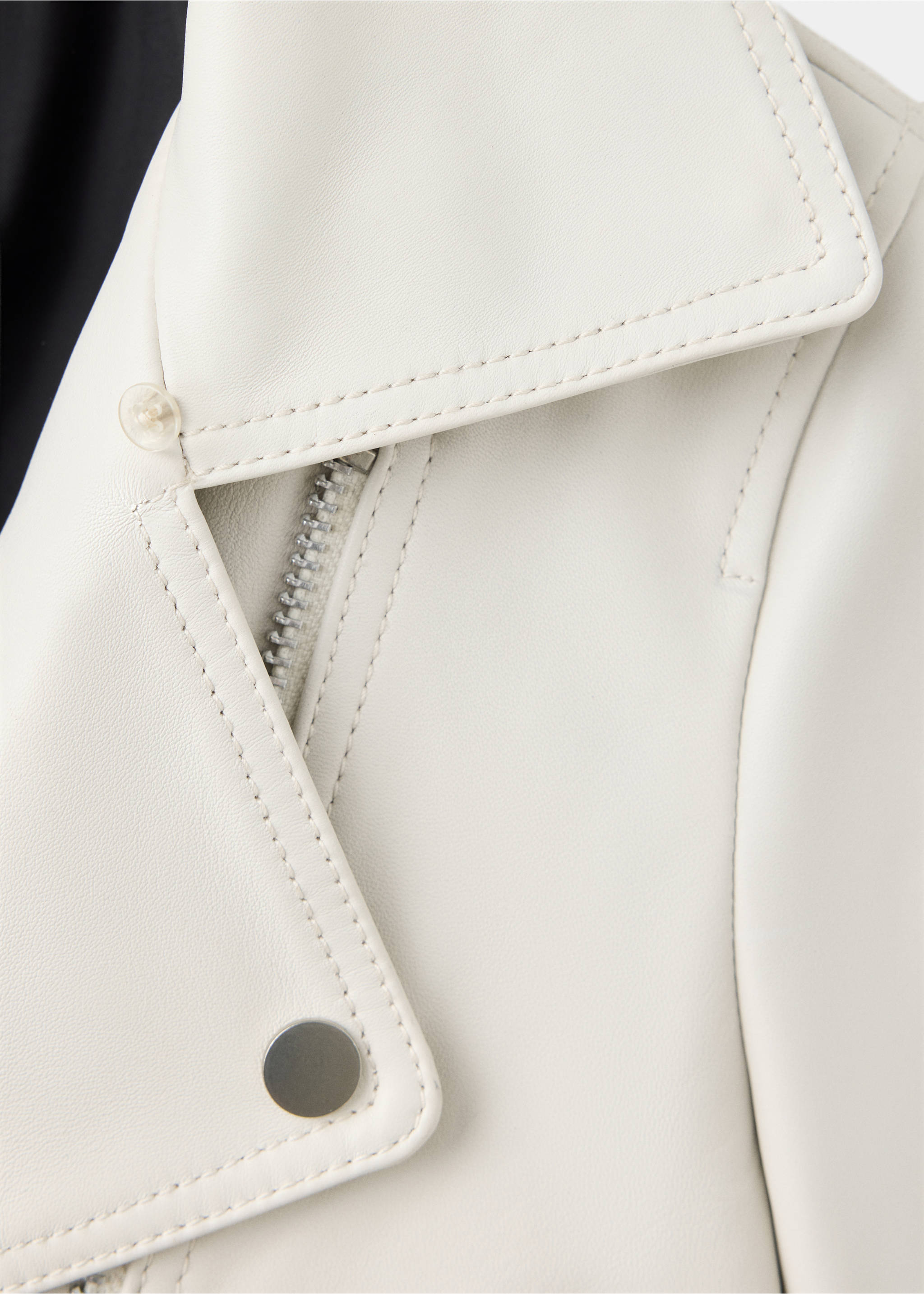 Close-up of white jacket fabric showing collar and metal zipper detail., White. Ref: 37069141-00.