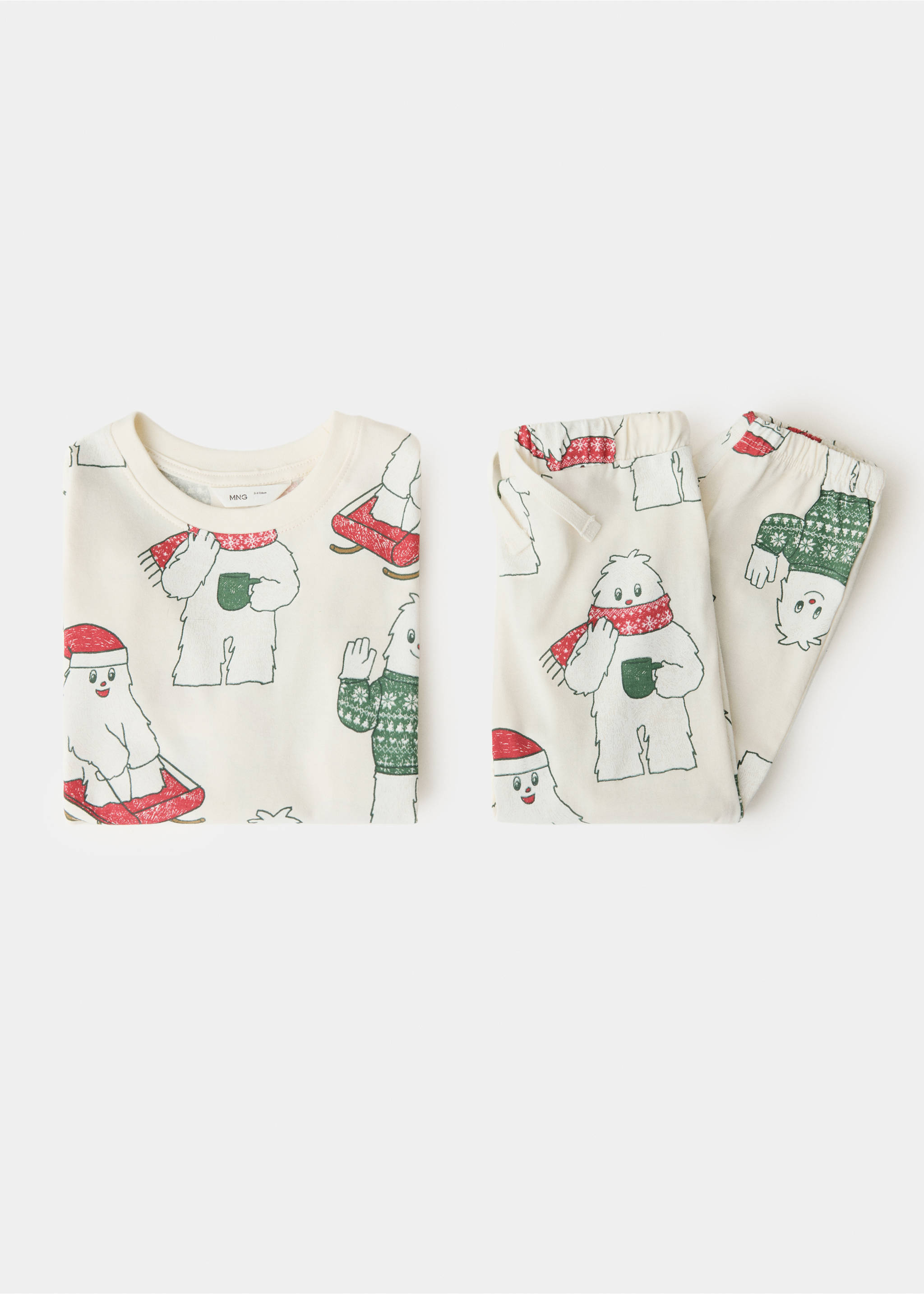 Children's festive yeti-print pyjama set featuring a long-sleeved top and trousers., Off White. Ref: 37069209-00.