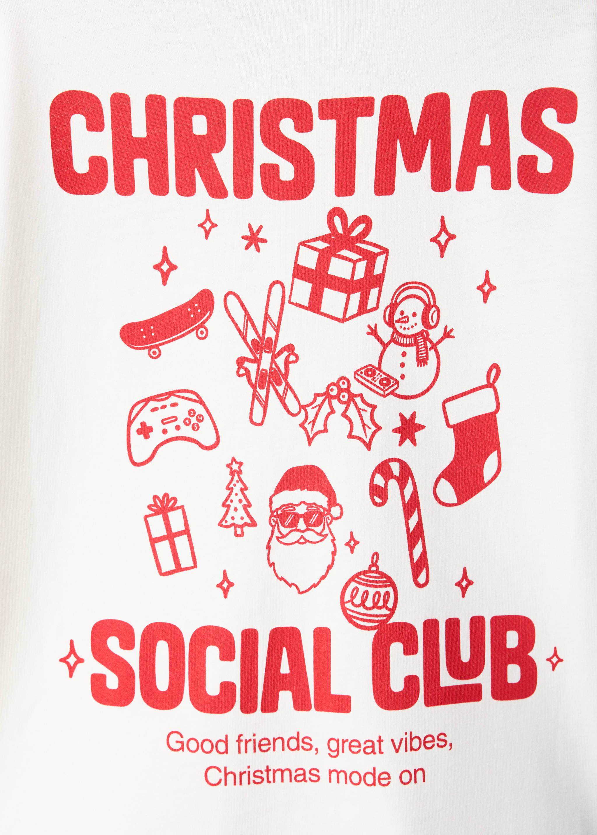 Close-up of a white t-shirt with red Christmas graphics and text.