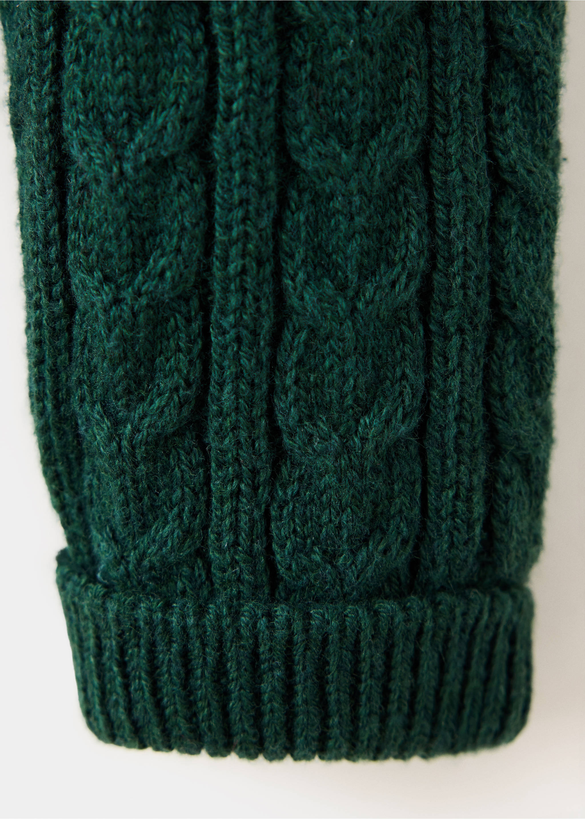 Close-up of dark green children's cable-knit trousers texture., Green. Ref: 37069216-00.