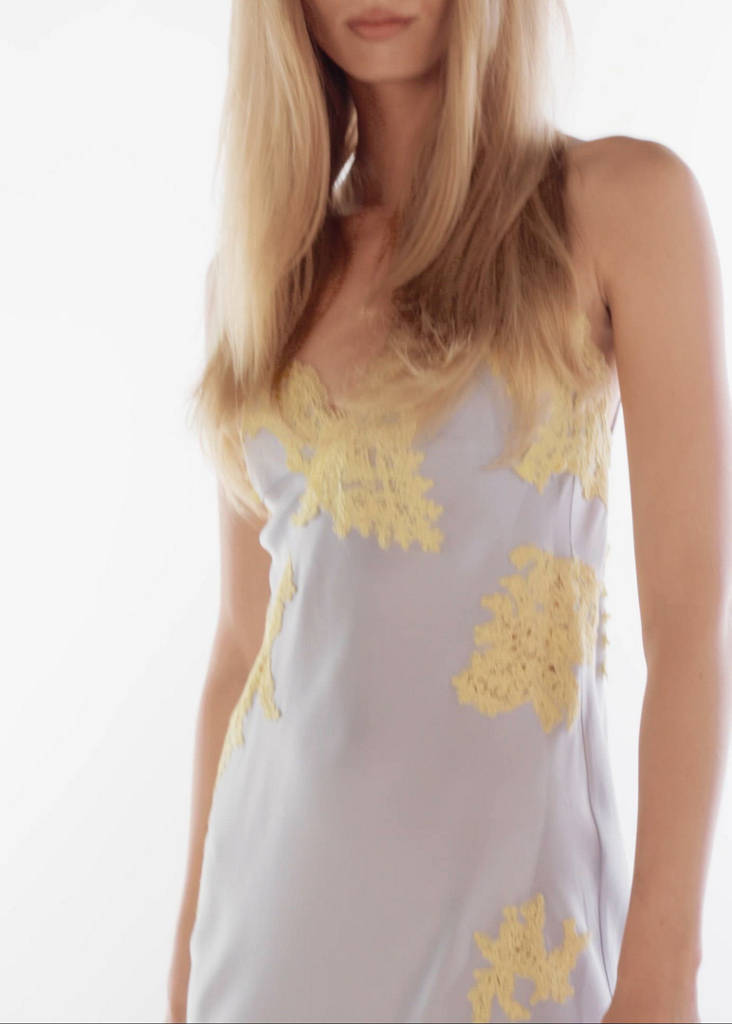 Satin dress with raised blonde lace