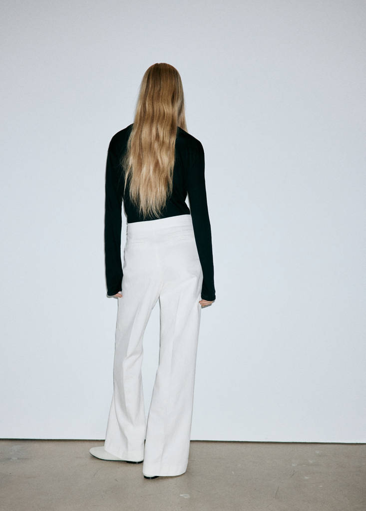 Wide-leg jeans with side buttons — White