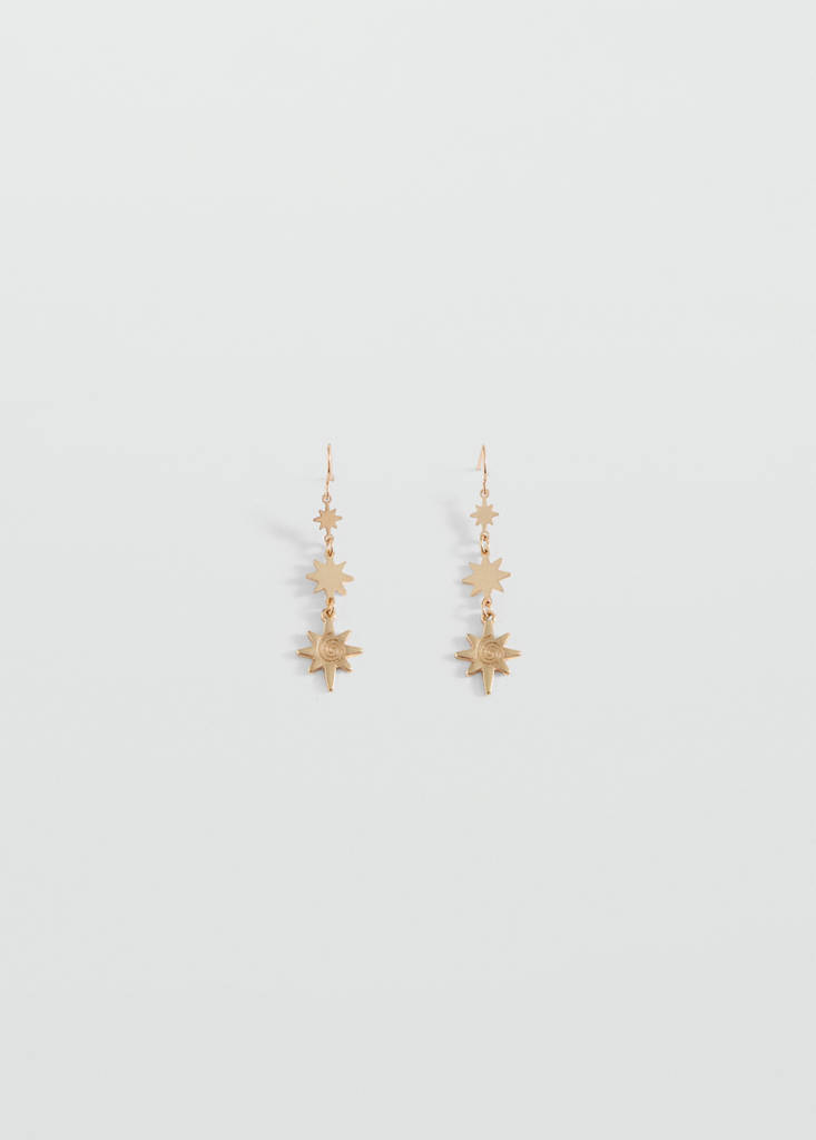 Long star earrings — Gold
