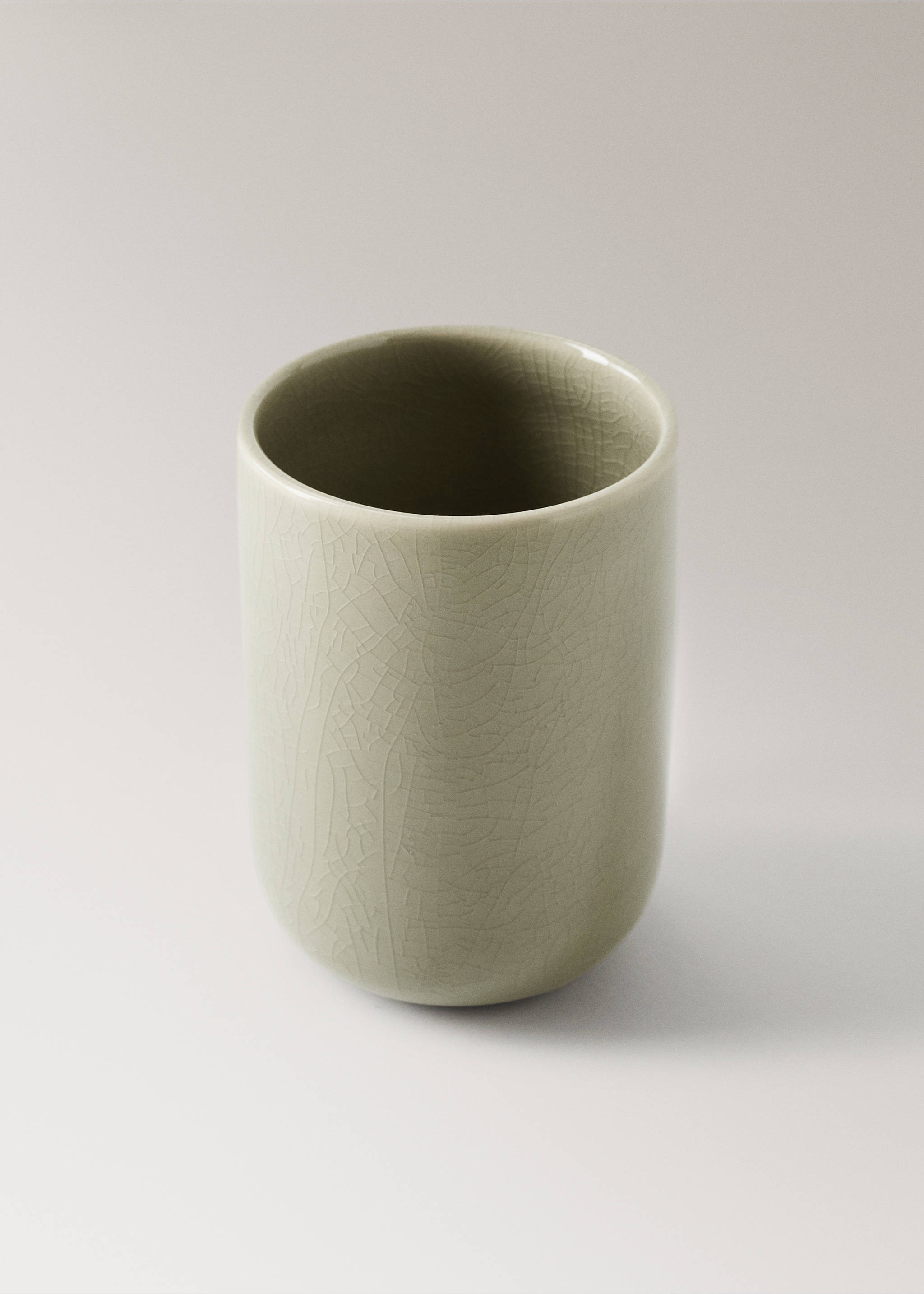 Crackled ceramic toothbrush cup - Details of the article 1, Pastel Green. Ref: 37073284-00.