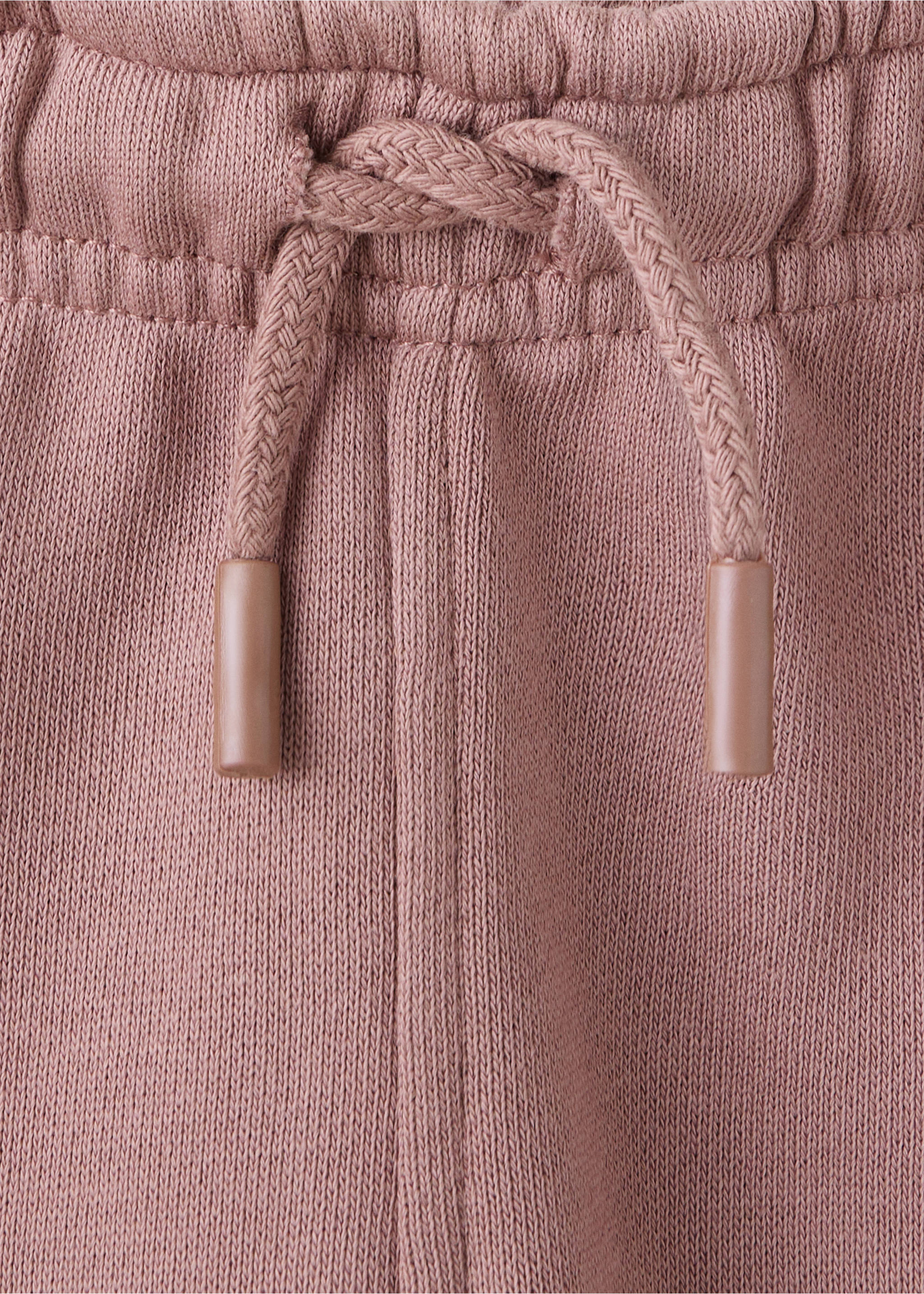 100% cotton jogger trousers - Details of the article 8, Pale Pink. Ref: 37073307-00.