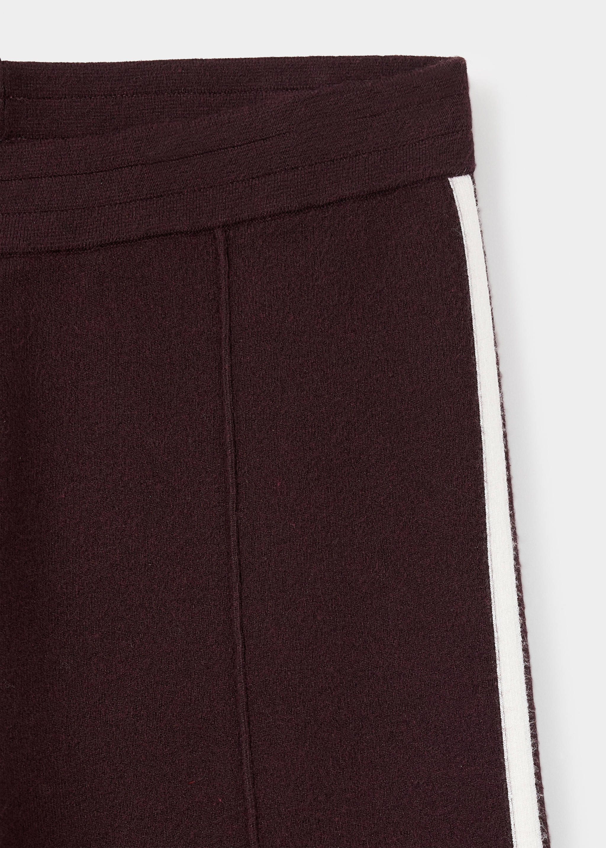 Knitted trousers with contrasting stripes - Details of the article 8