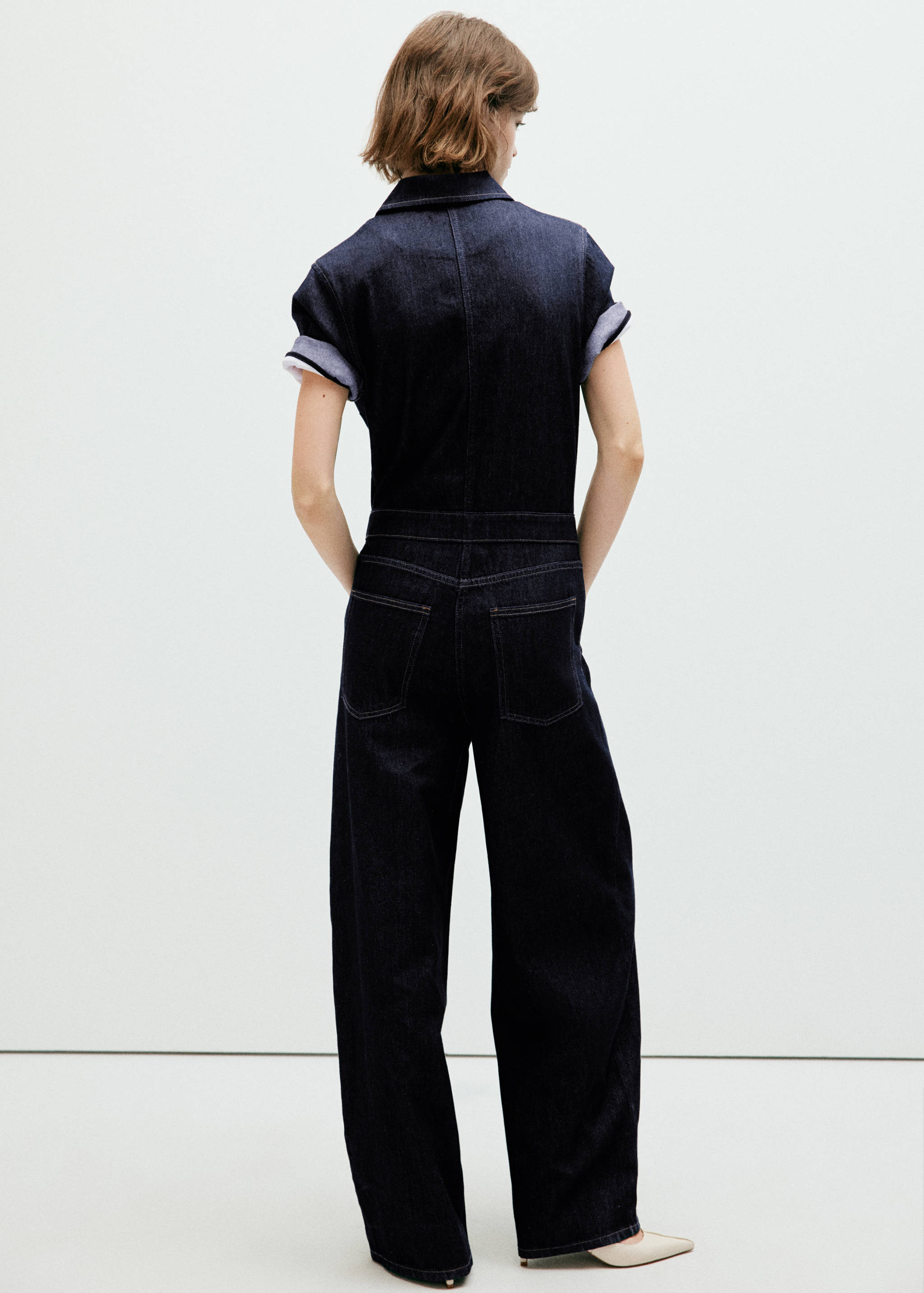 Short-sleeved denim jumpsuit - Reverse of the article