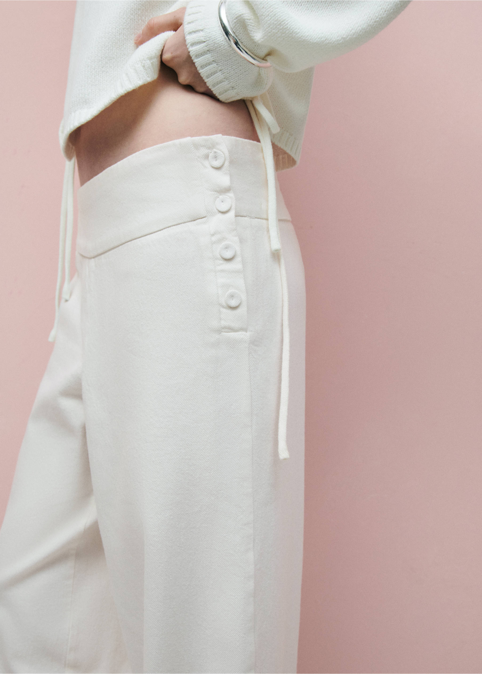 Barrel trousers with button detail - Details of the article 2, Off White. Ref: 37074102-00.