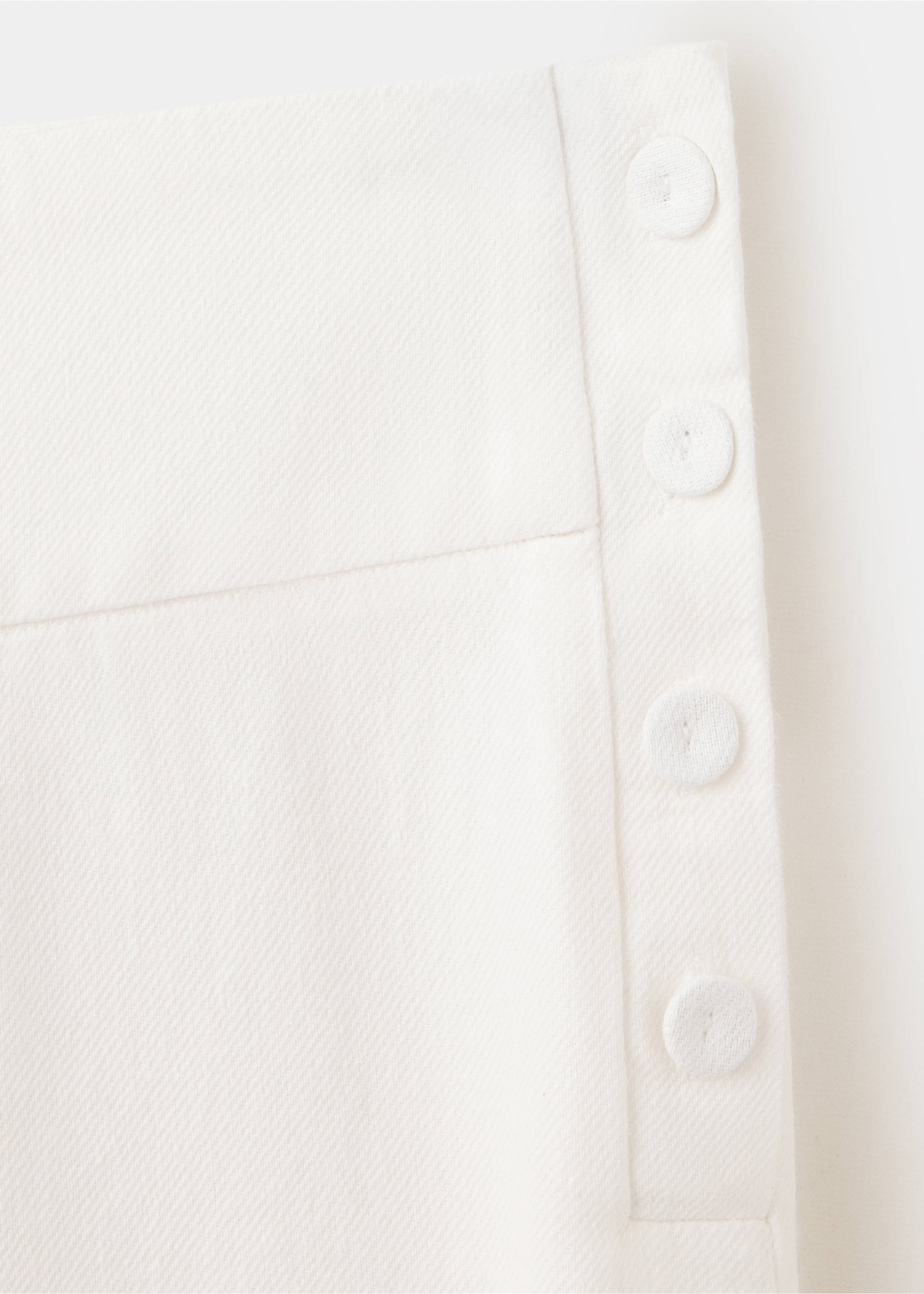 Barrel trousers with button detail - Details of the article 8, Off White. Ref: 37074102-00.