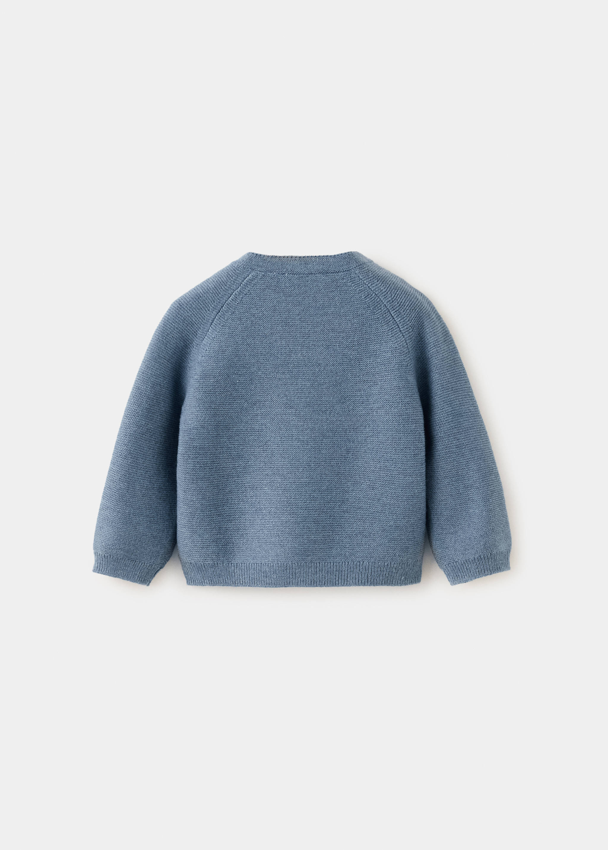 Buttoned knit sweater - Reverse of the article