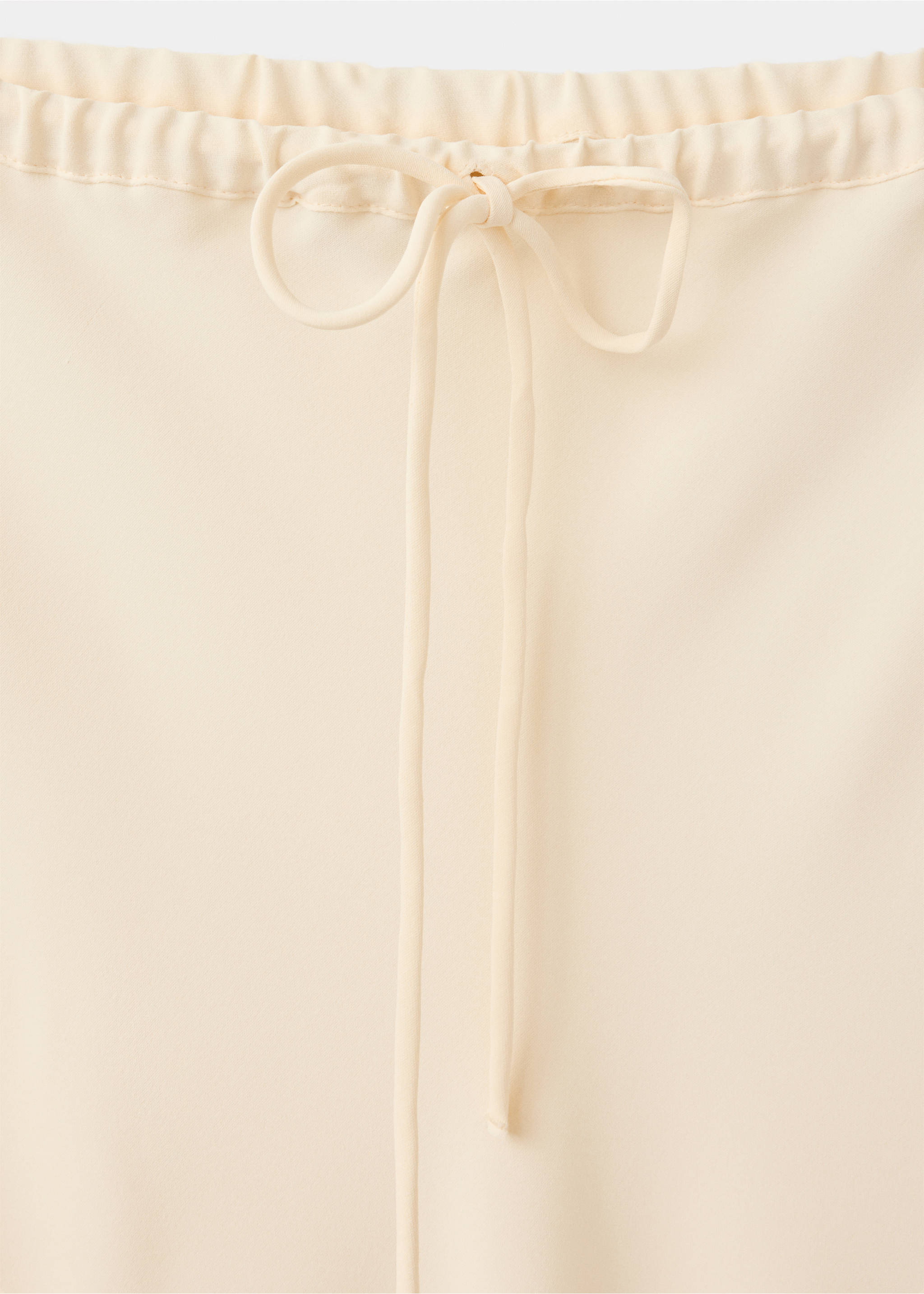 Elastic-waist skirt with slits - Details of the article 8, Ecru. Ref: 37074468-00.