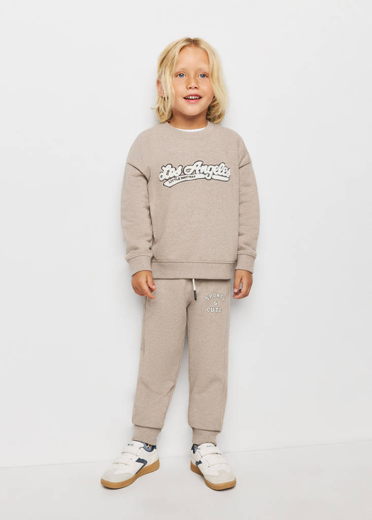 Jogger trousers with printed detail — Sand
