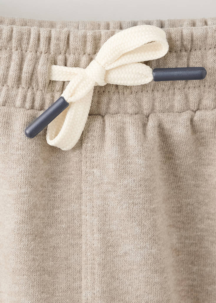 Jogger trousers with printed detail — Sand