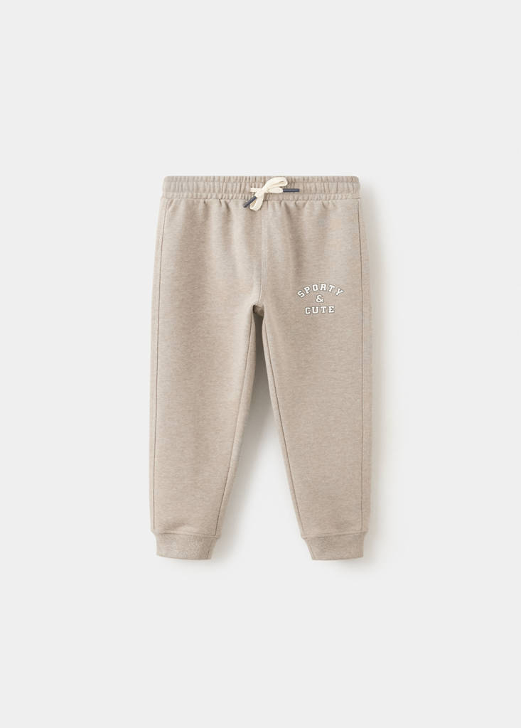 Jogger trousers with printed detail — Sand