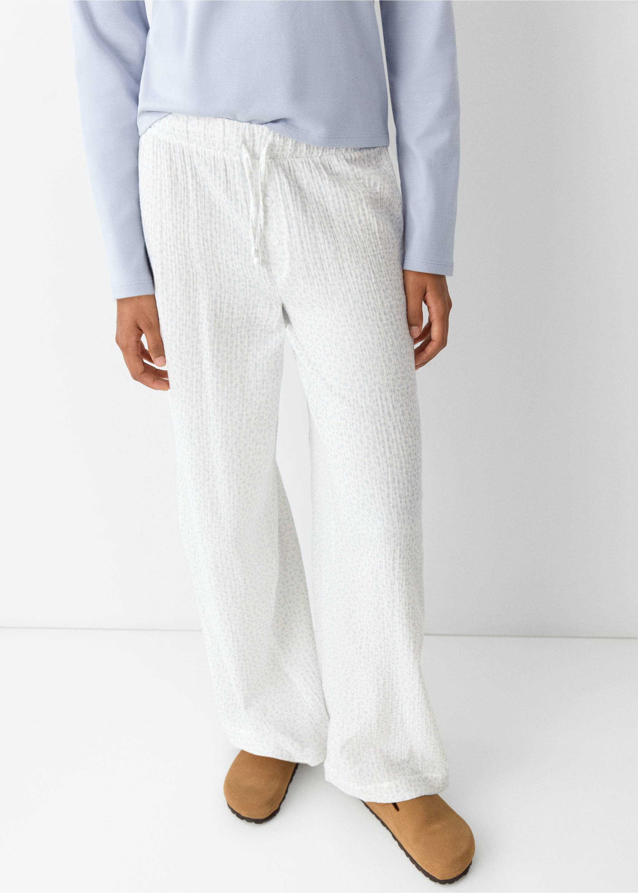White patterned pyjama trousers with a drawstring waist, worn with a light blue top., Aqua Green. Ref: 37075855-00.