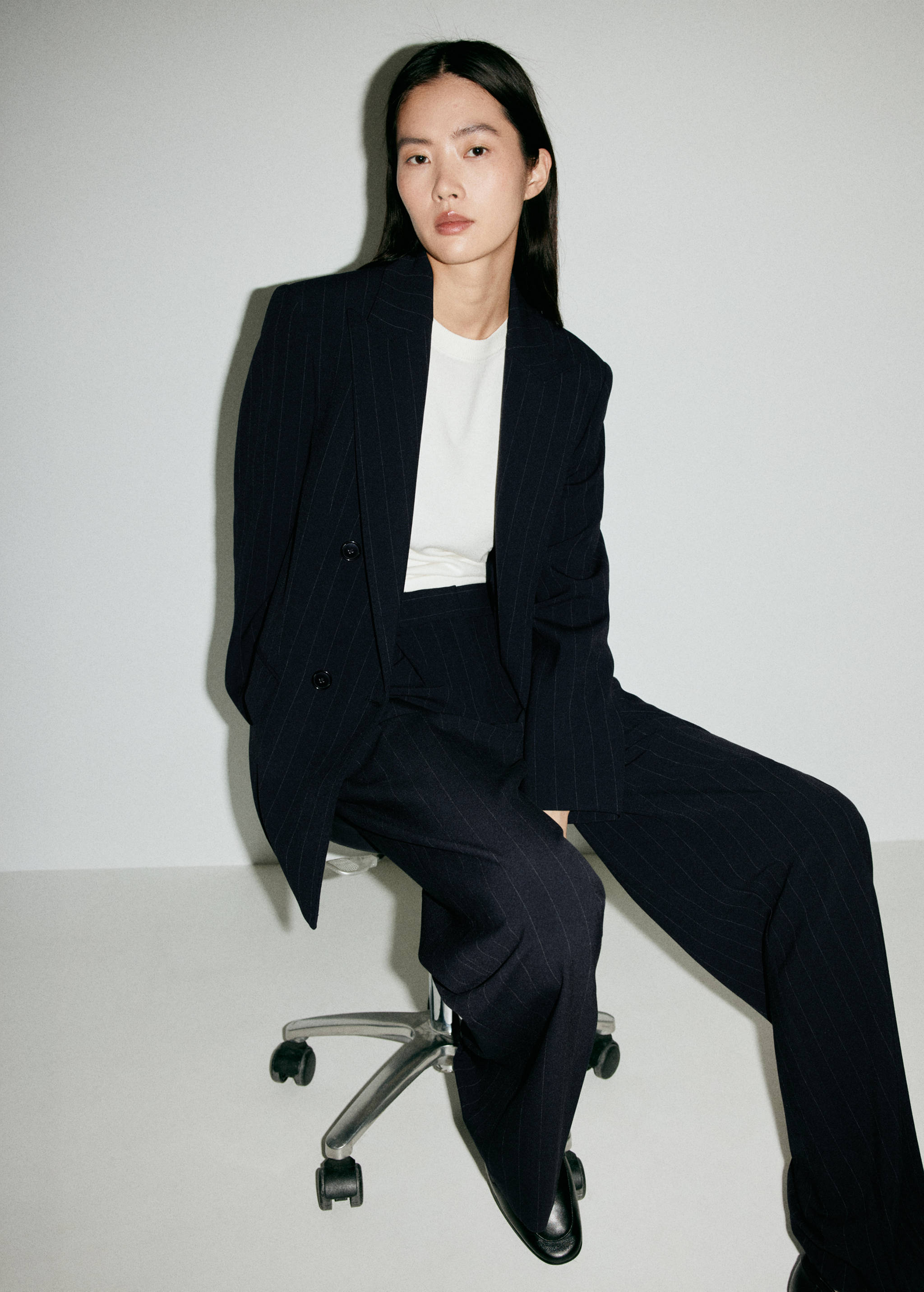 Pinstripe pleated trousers - Details of the article 1