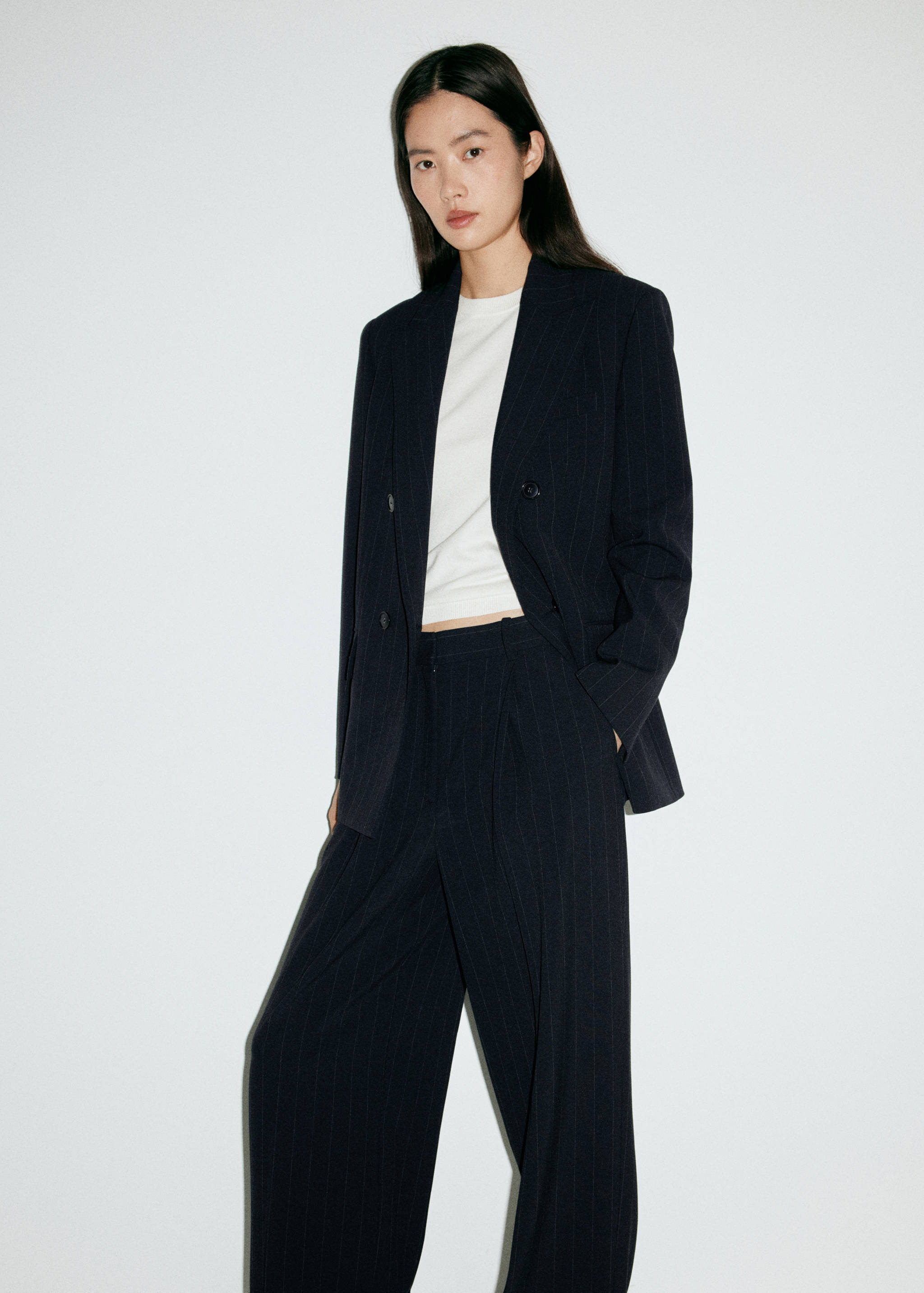 Pinstripe pleated trousers - Details of the article 3