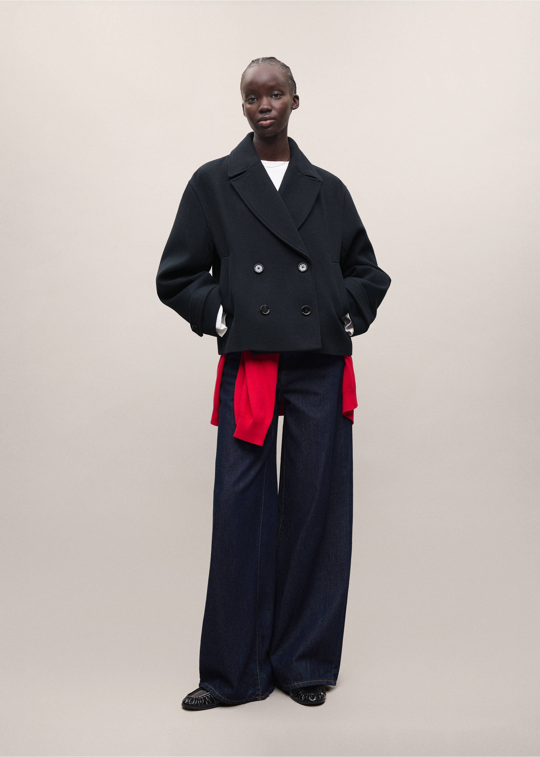 Navy blue double-breasted coat with lapels and buttons worn with wide-leg trousers., Navy. Ref: 37075973-01.