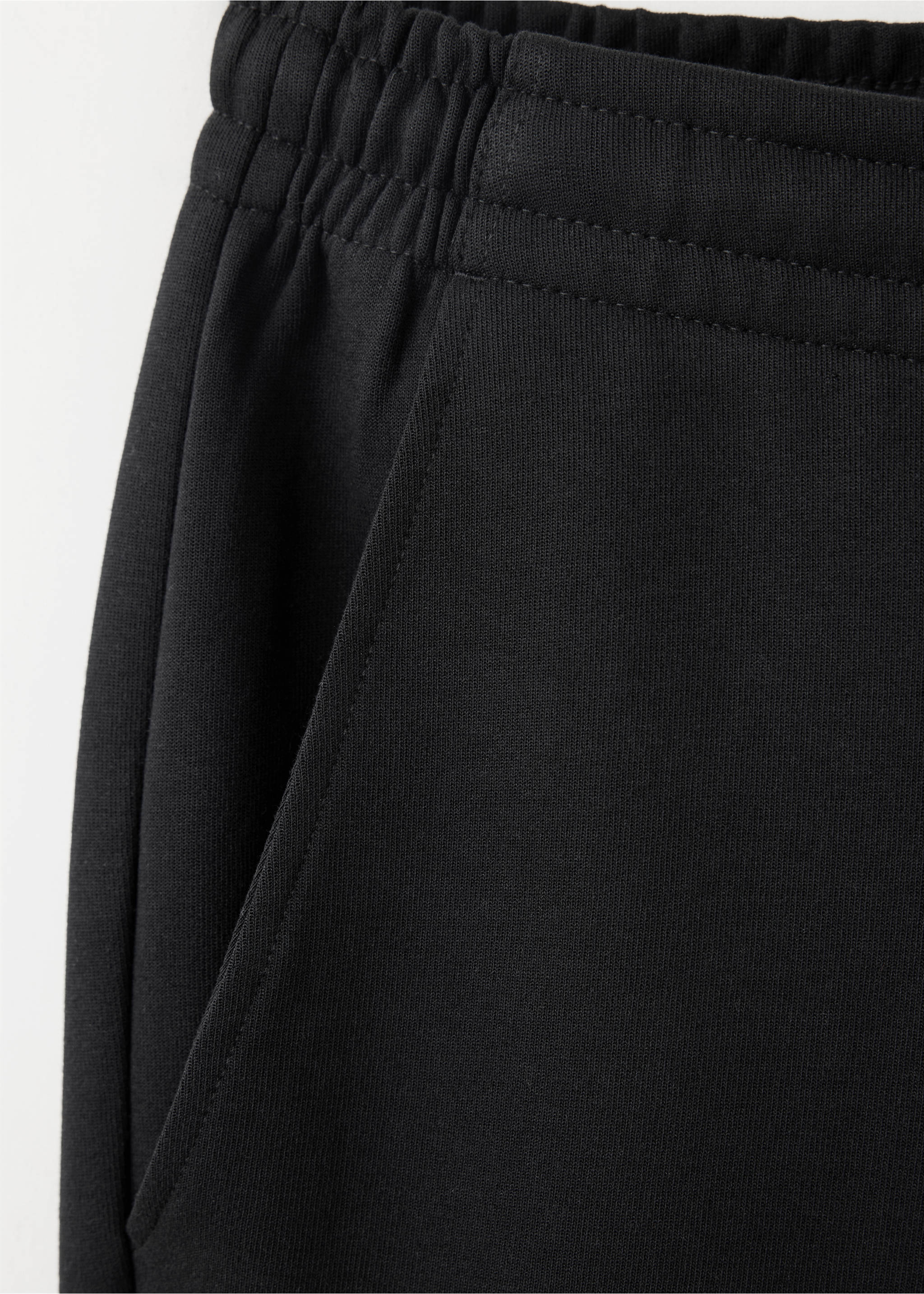 Cotton joggers with elastic waist - Details of the article 0, Black. Ref: 37075998-00.